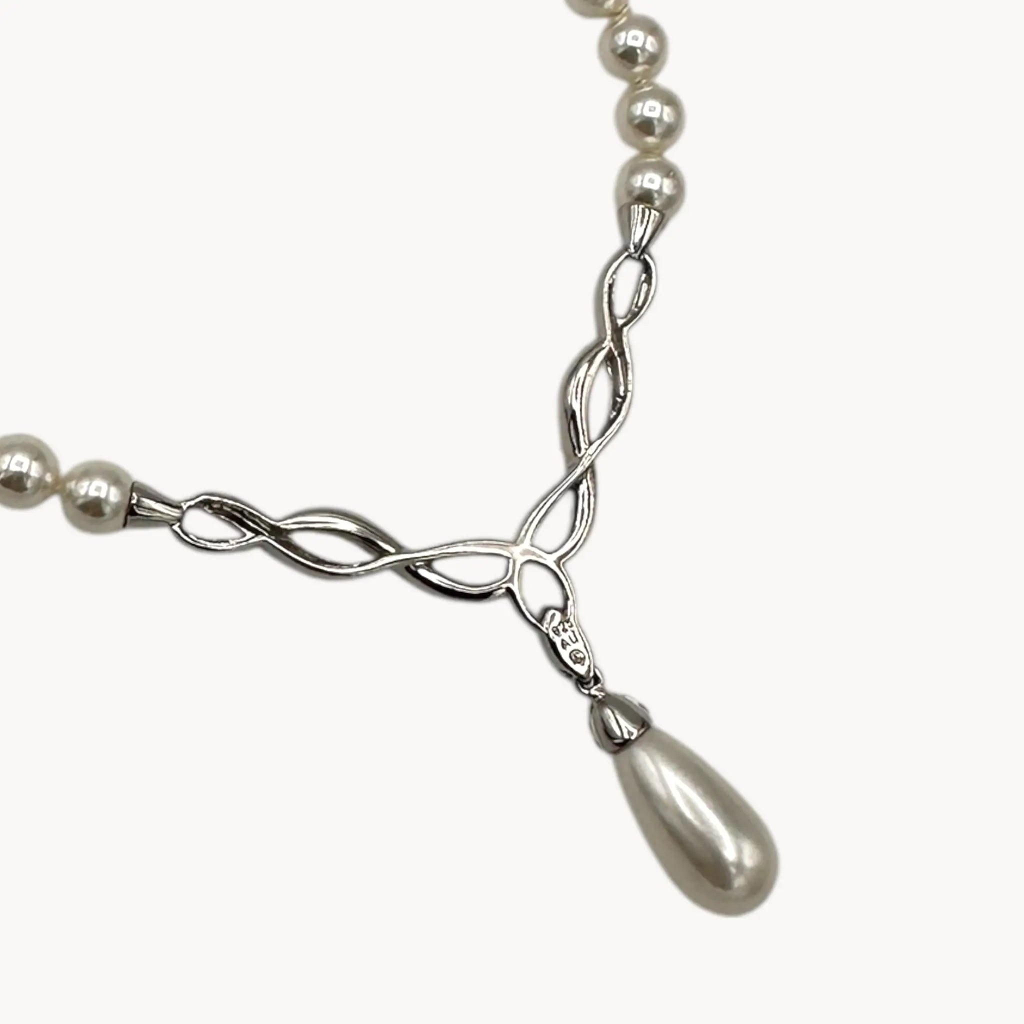 Artistique Sterling Silver Faux Pearl Strand Necklace with Rhinestone Drop Pendant