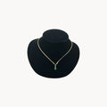 Vintage 14K yellow gold teardrop green spinel and diamond pendant necklace.