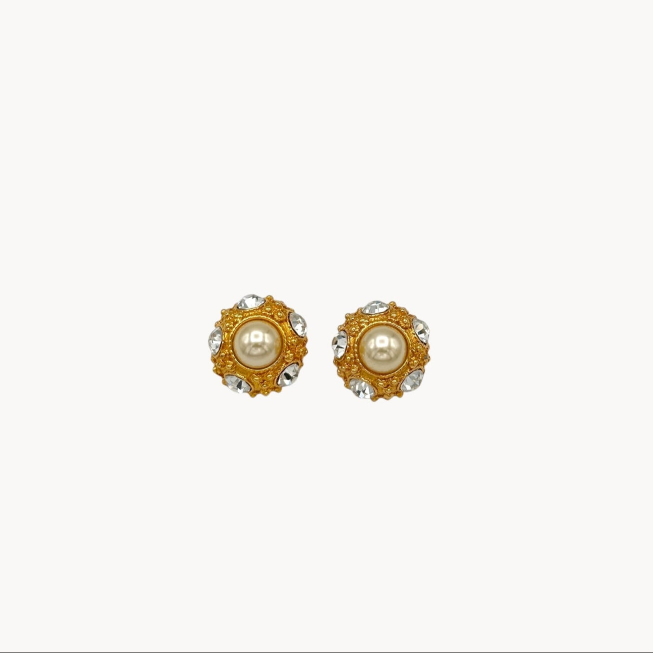 Vintage Blanca pearl and rhinestone gold-tone clip-on earrings.