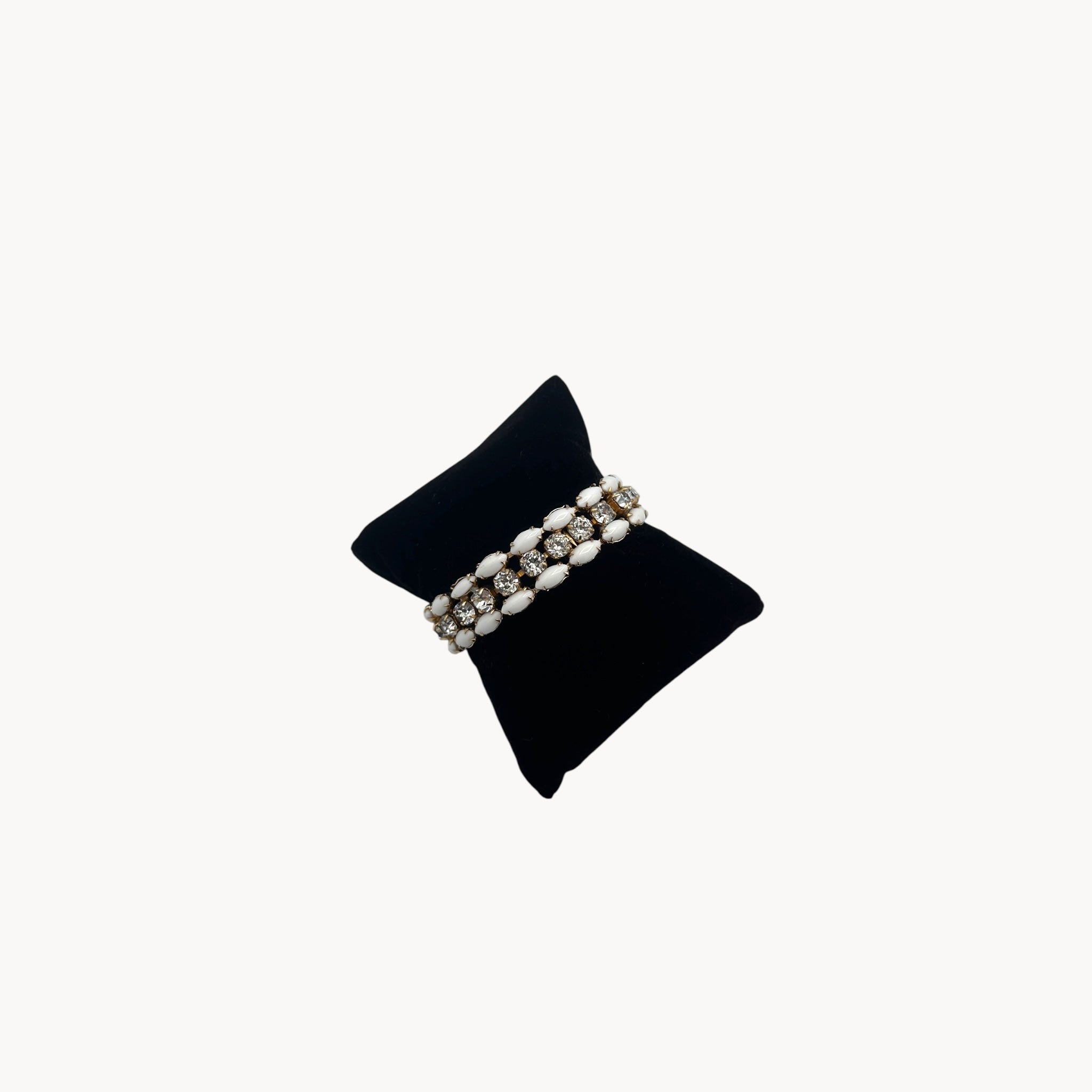 Mid-century Eisenberg bracelet with white milk glass and rhinestones, double-row design.