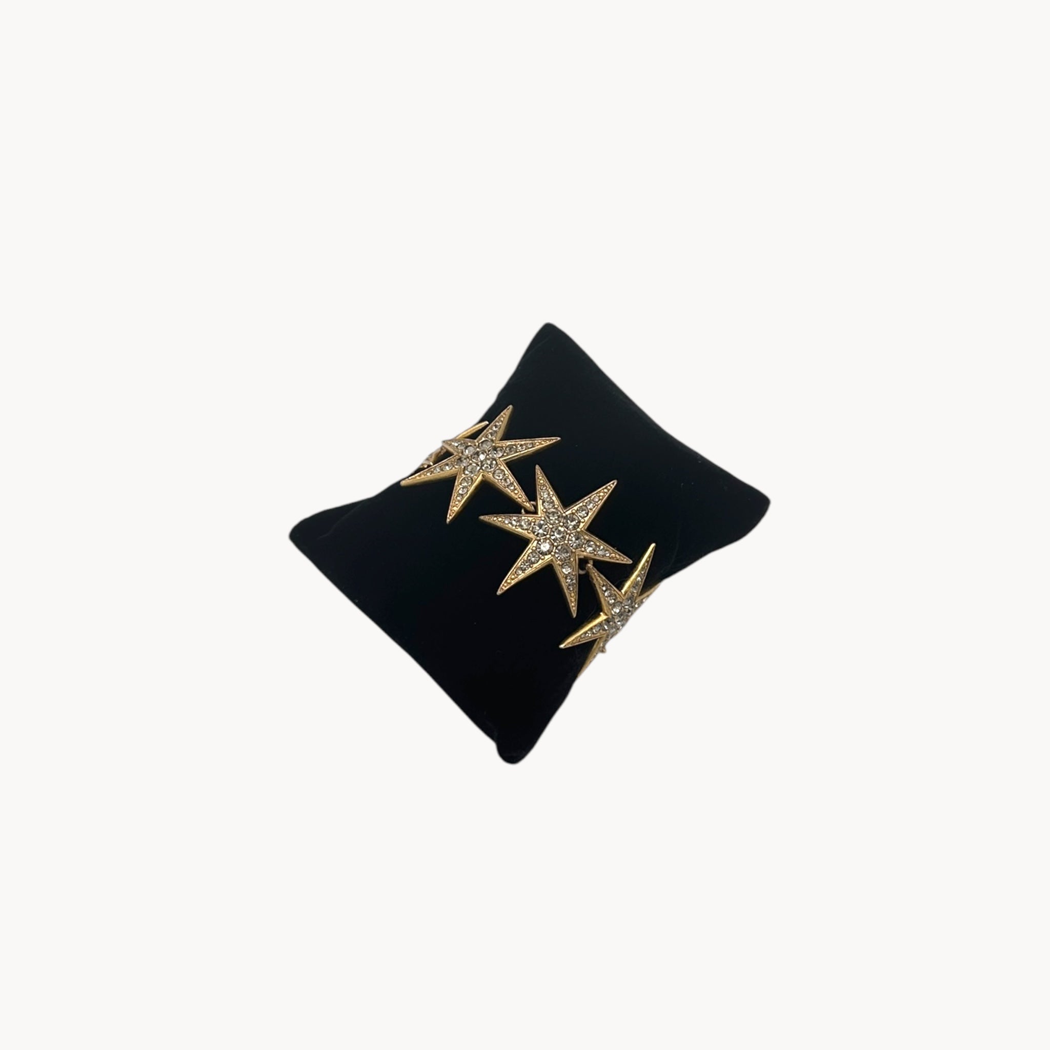 J. Crew gold-tone Art Deco style star bracelet with crystal accents.