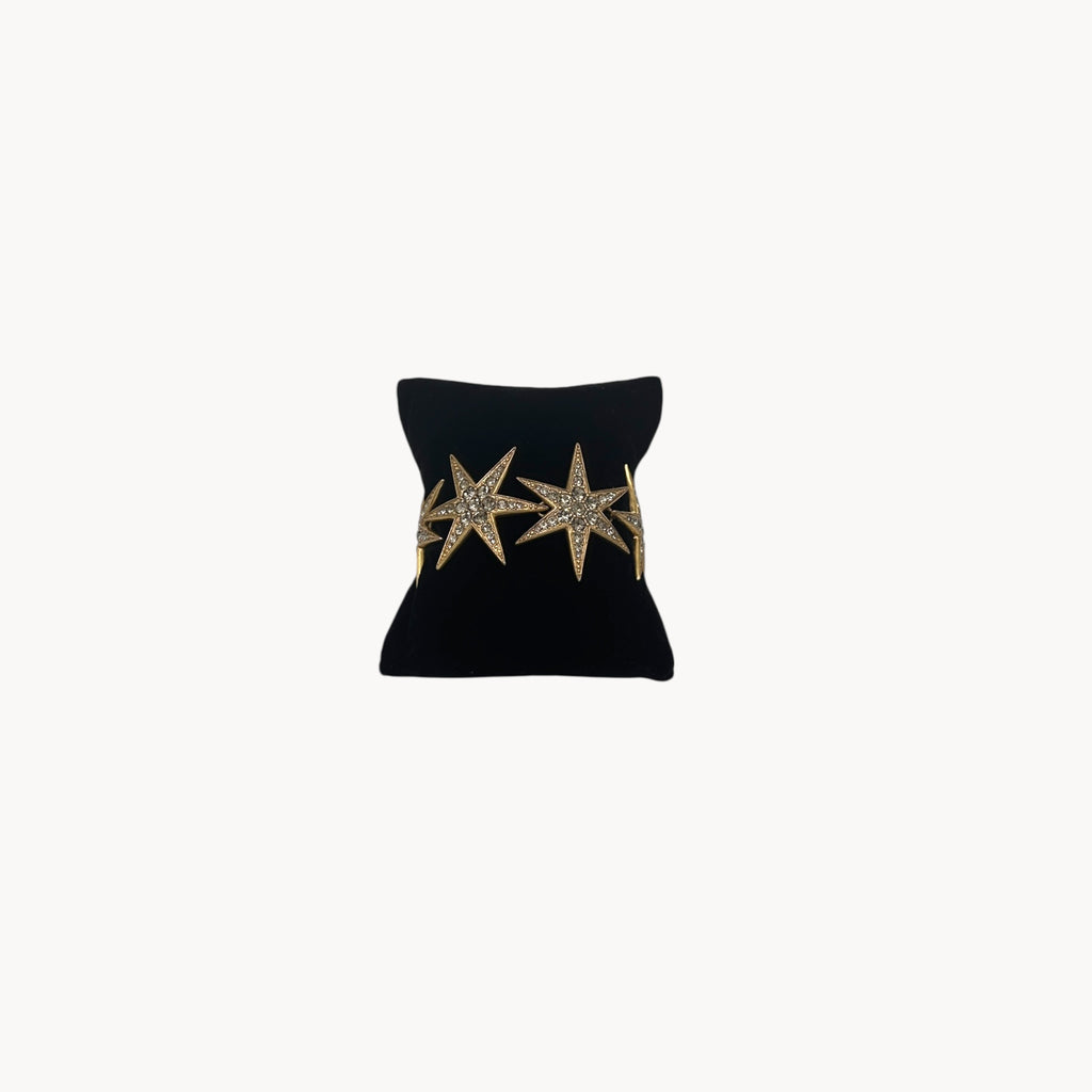 Front view of J. Crew gold-tone Art Deco style star bracelet with crystal accents.