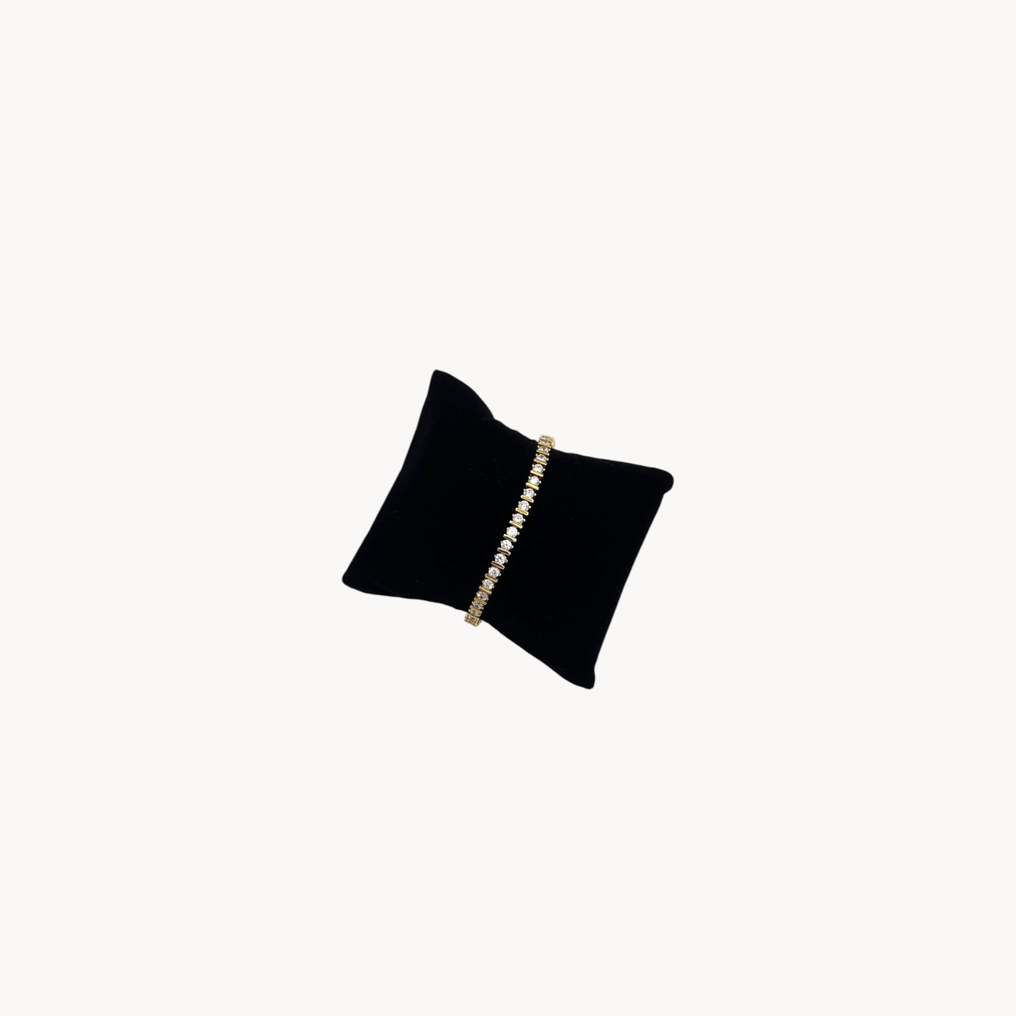 Side view of Lind 14K gold electroplated clear CZ tennis bracelet, vintage jewelry.