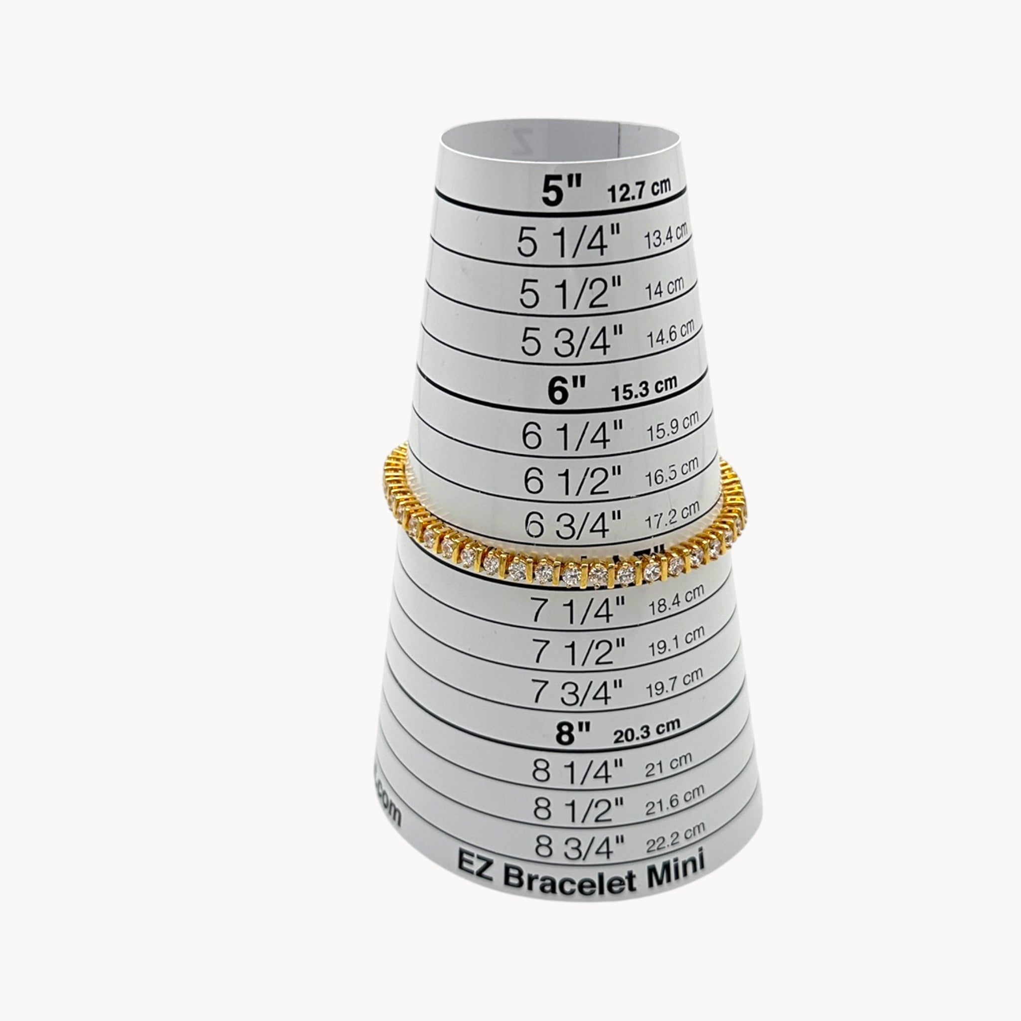 Size view of Lind 14K gold electroplated clear CZ tennis bracelet, vintage jewelry.
