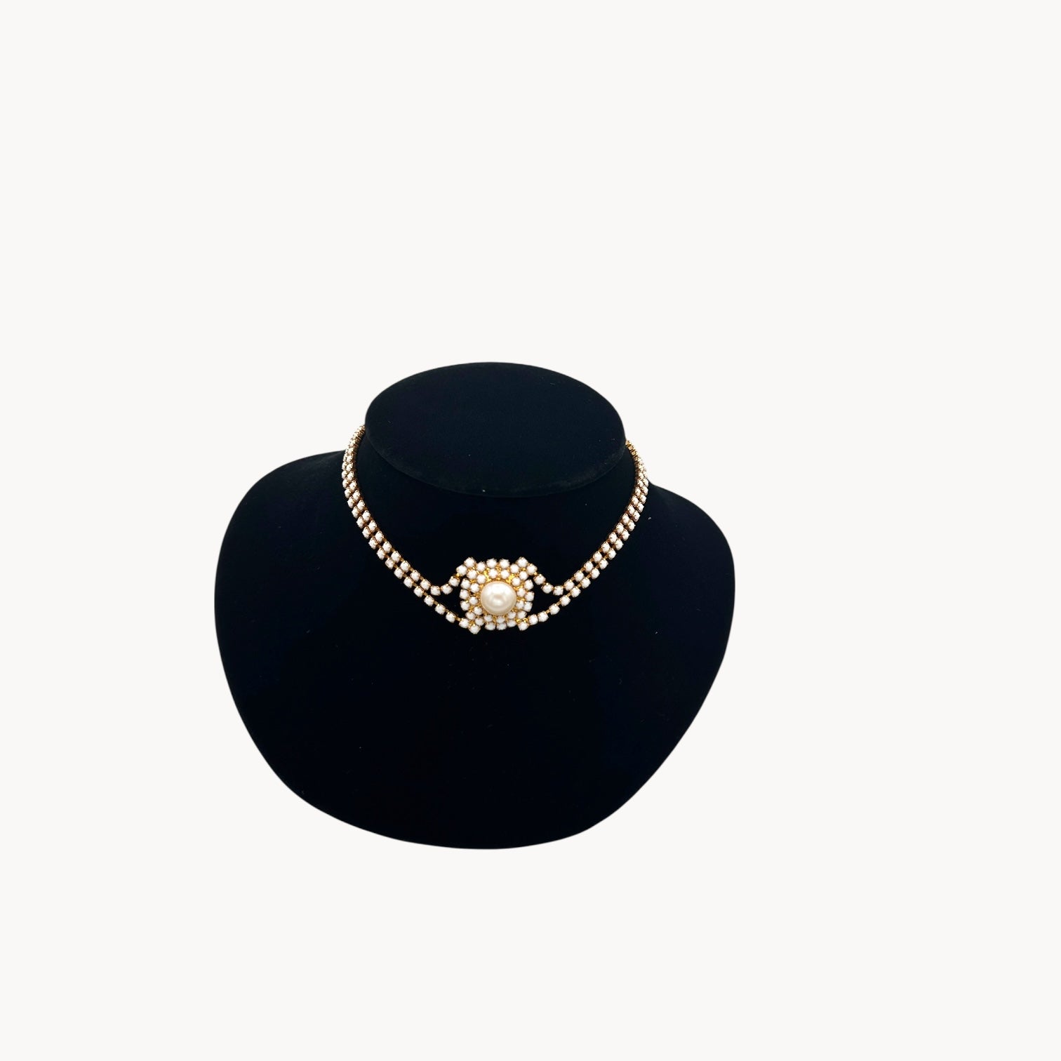 Mid-century milk glass rhinestone bridal choker necklace with central pearl medallion.