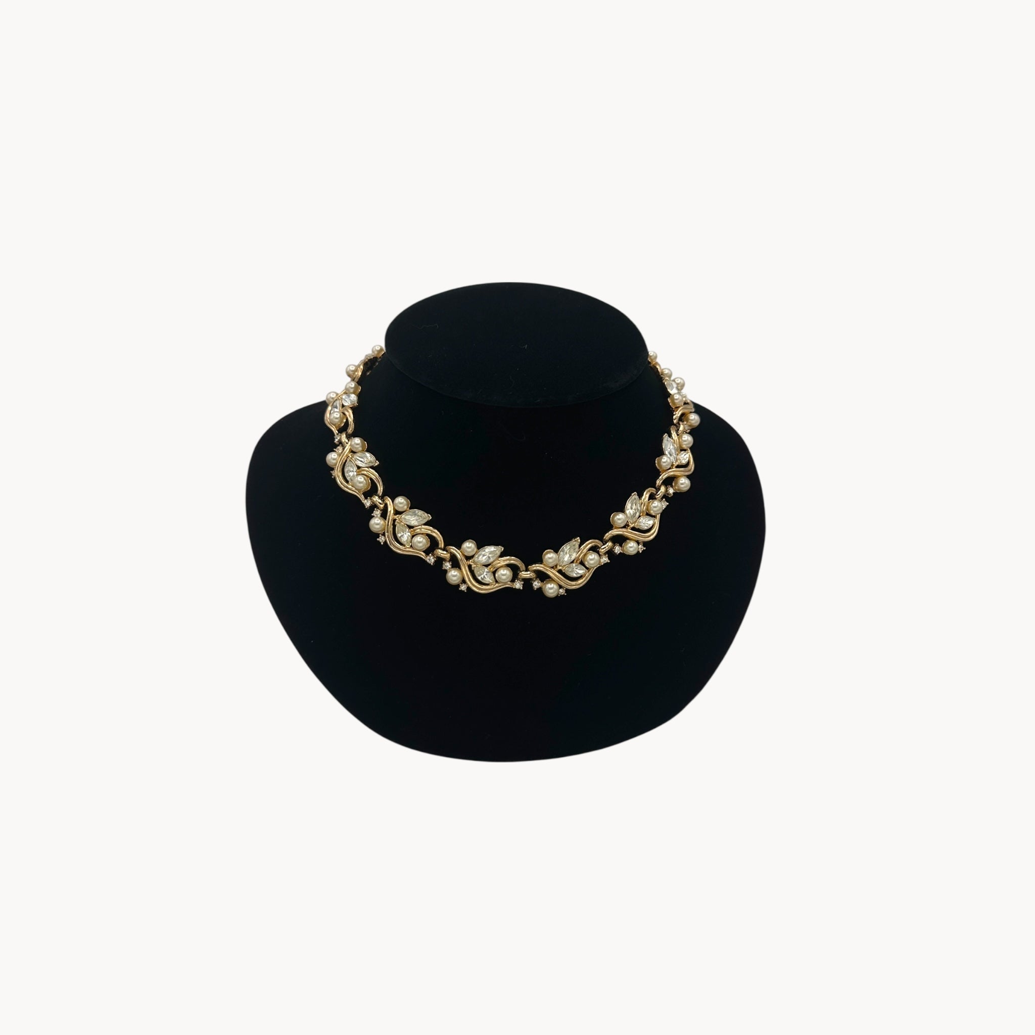 Midcentury gold floral rhinestone necklace with faux pearls.