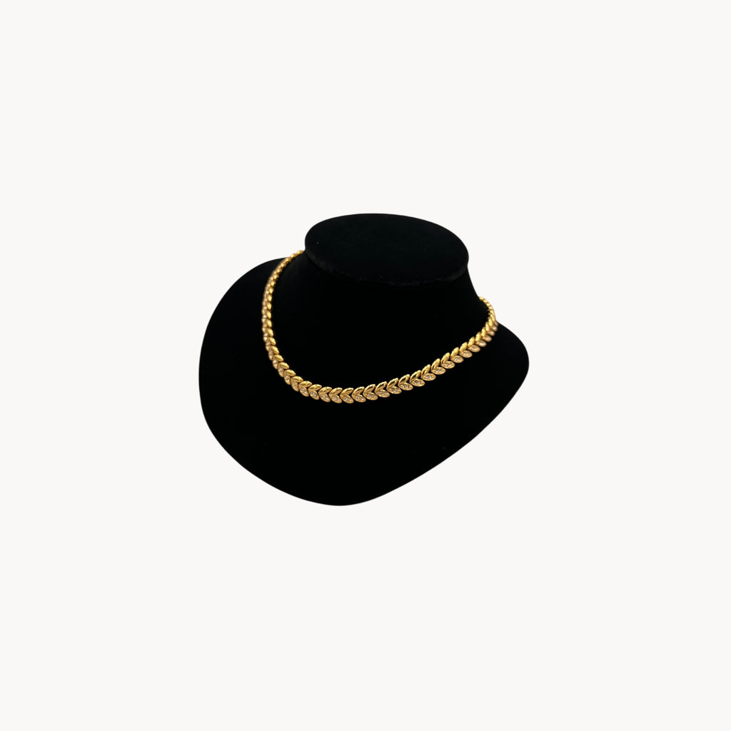 Side view of Avon vintage gold link rhinestone necklace, classic 1980s–1990s bridal and evening jewelry.