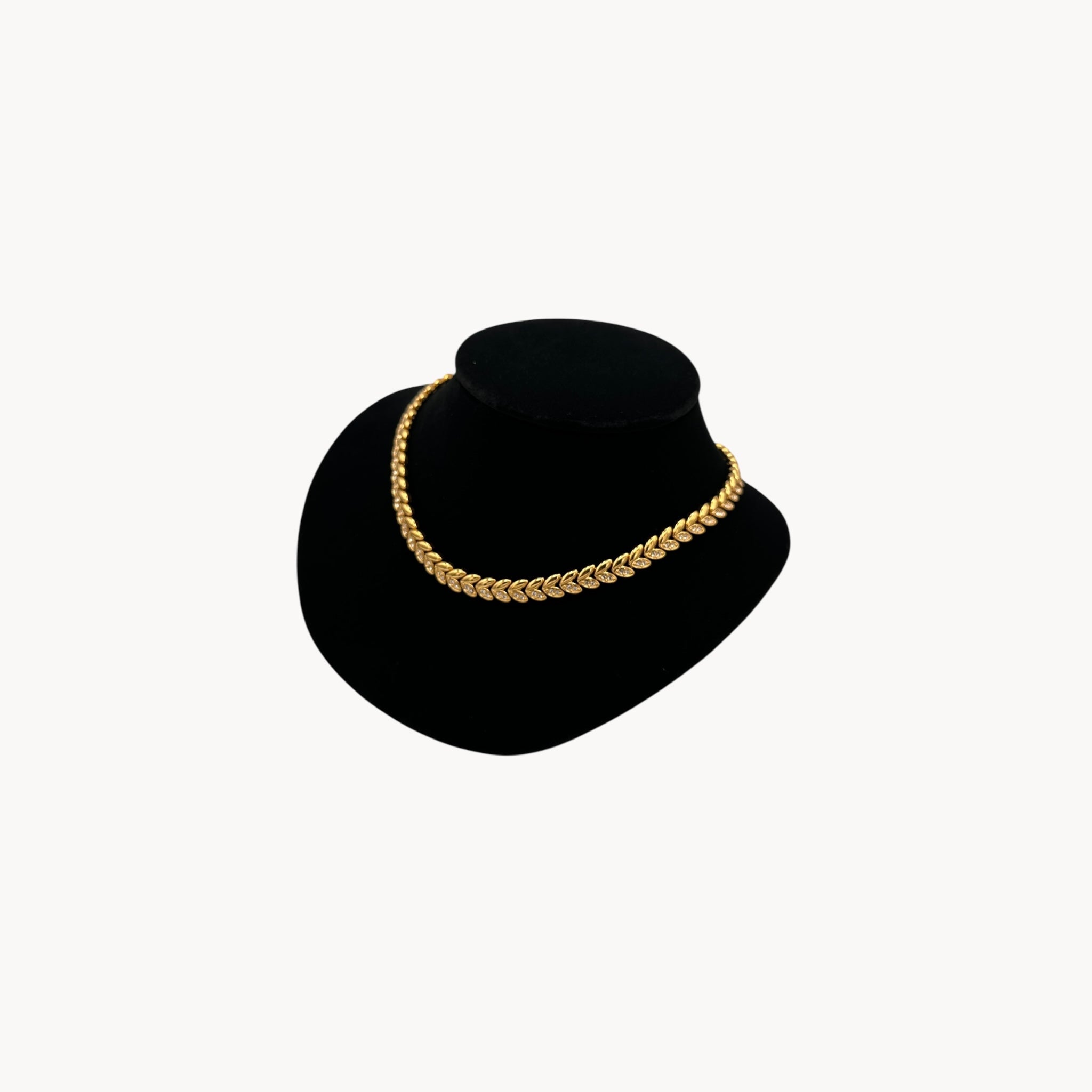 Side view of Avon vintage gold link rhinestone necklace, classic 1980s–1990s bridal and evening jewelry.