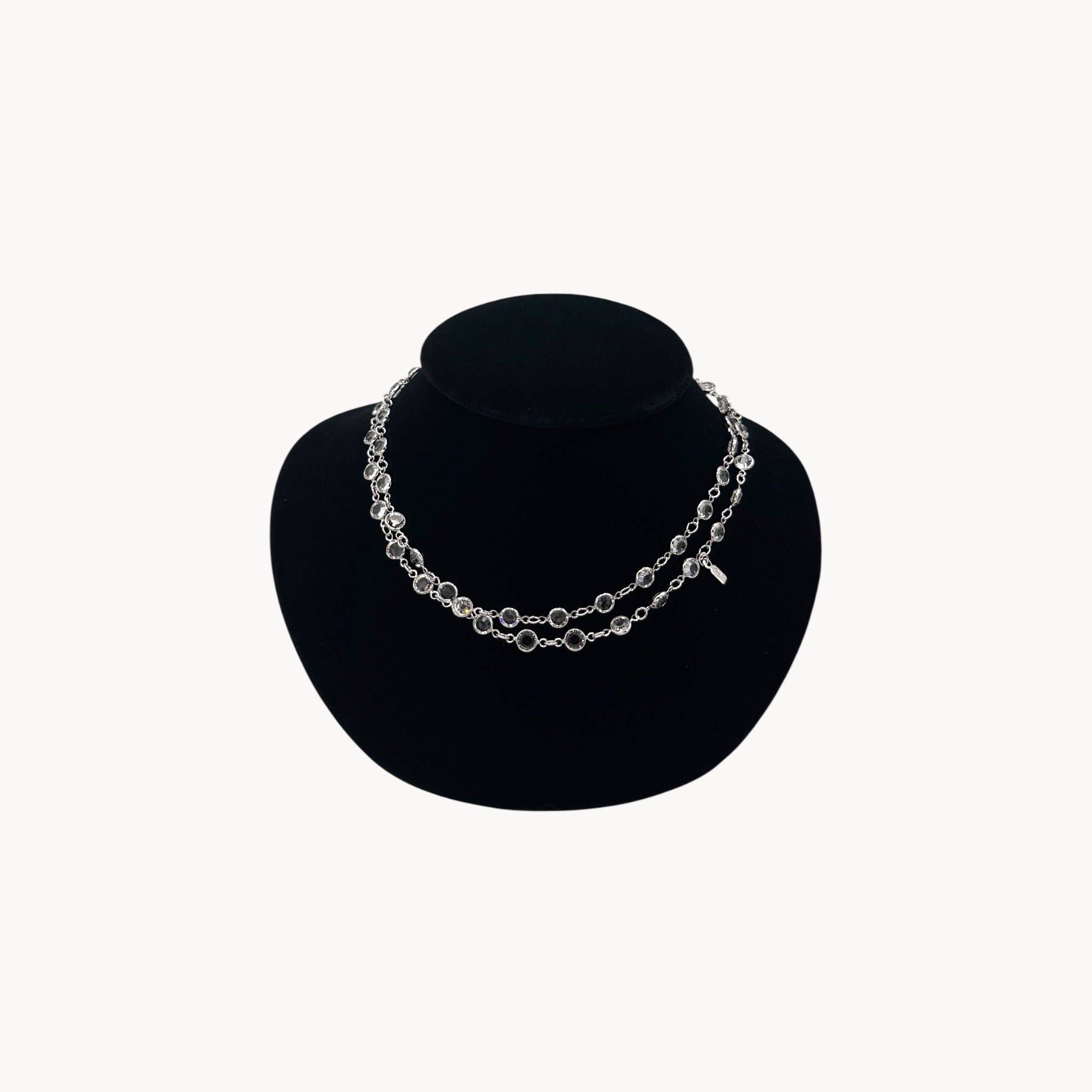 Swarovski faceted clear crystal bezel set long necklace.