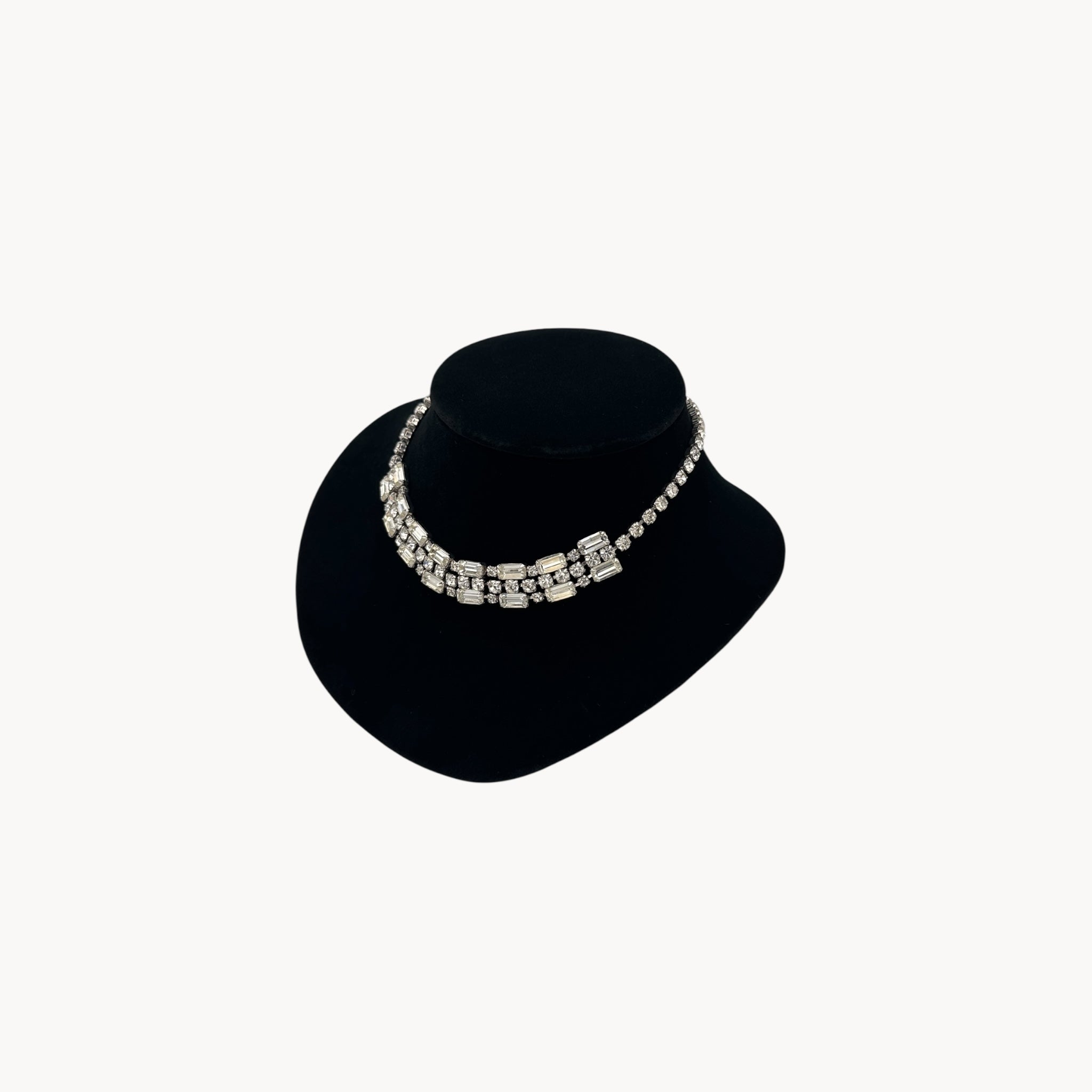 Side view of Vintage Art Deco style rhinestone choker necklace with baguette and round stones, unmarked 1950s bridal jewelry