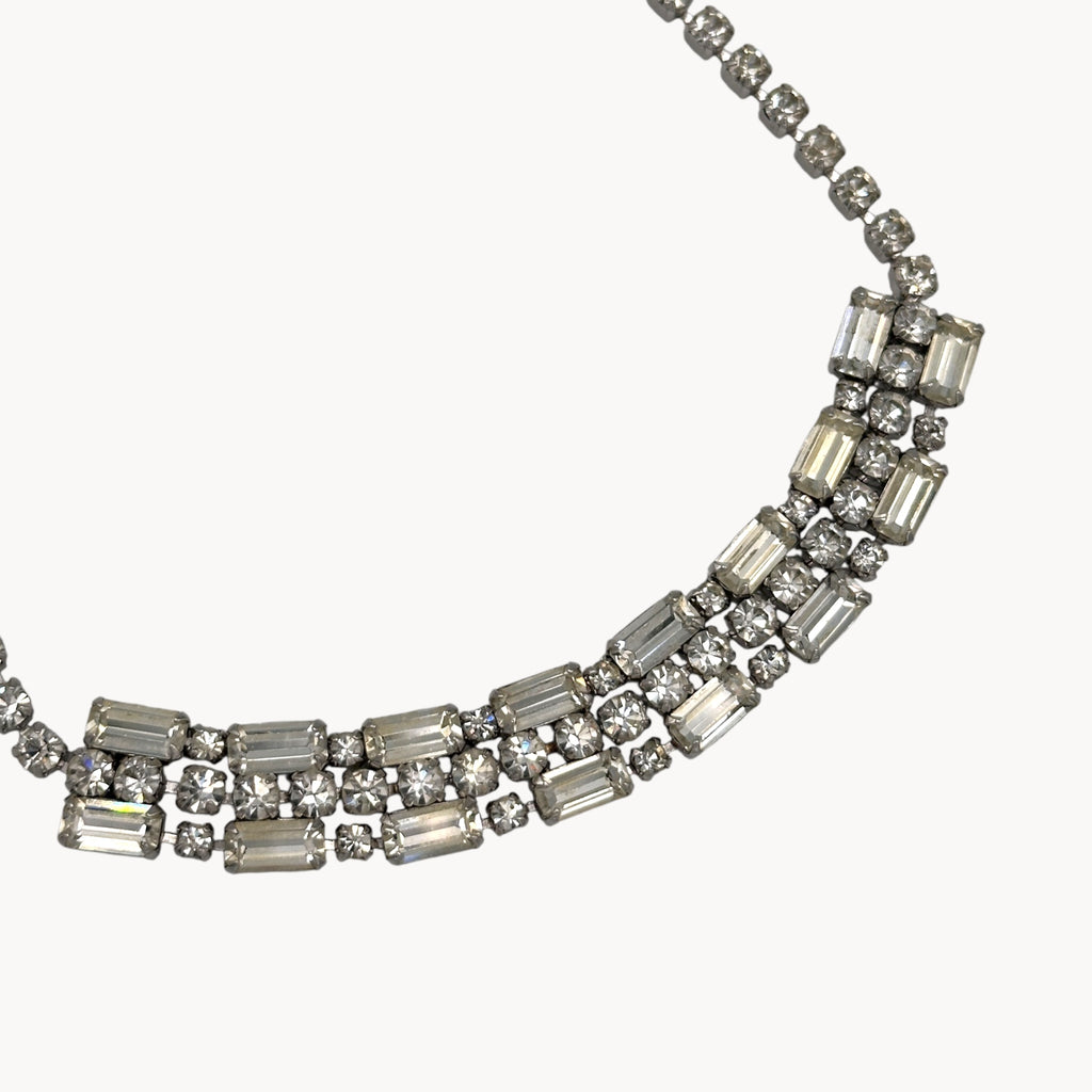 Close up of pendant Vintage Art Deco style rhinestone choker necklace with baguette and round stones, unmarked 1950s bridal jewelry