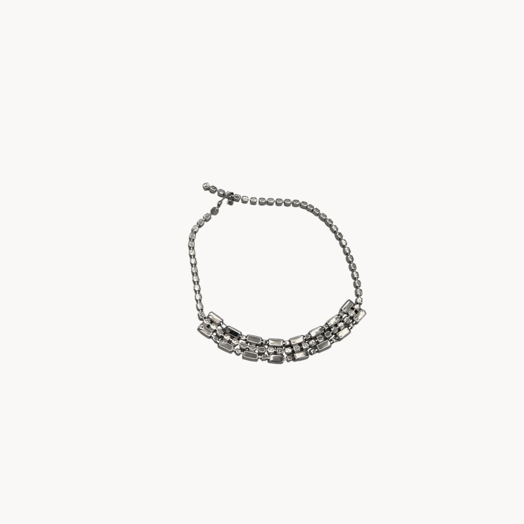 Back view of Vintage Art Deco style rhinestone choker necklace with baguette and round stones, unmarked 1950s bridal jewelry
