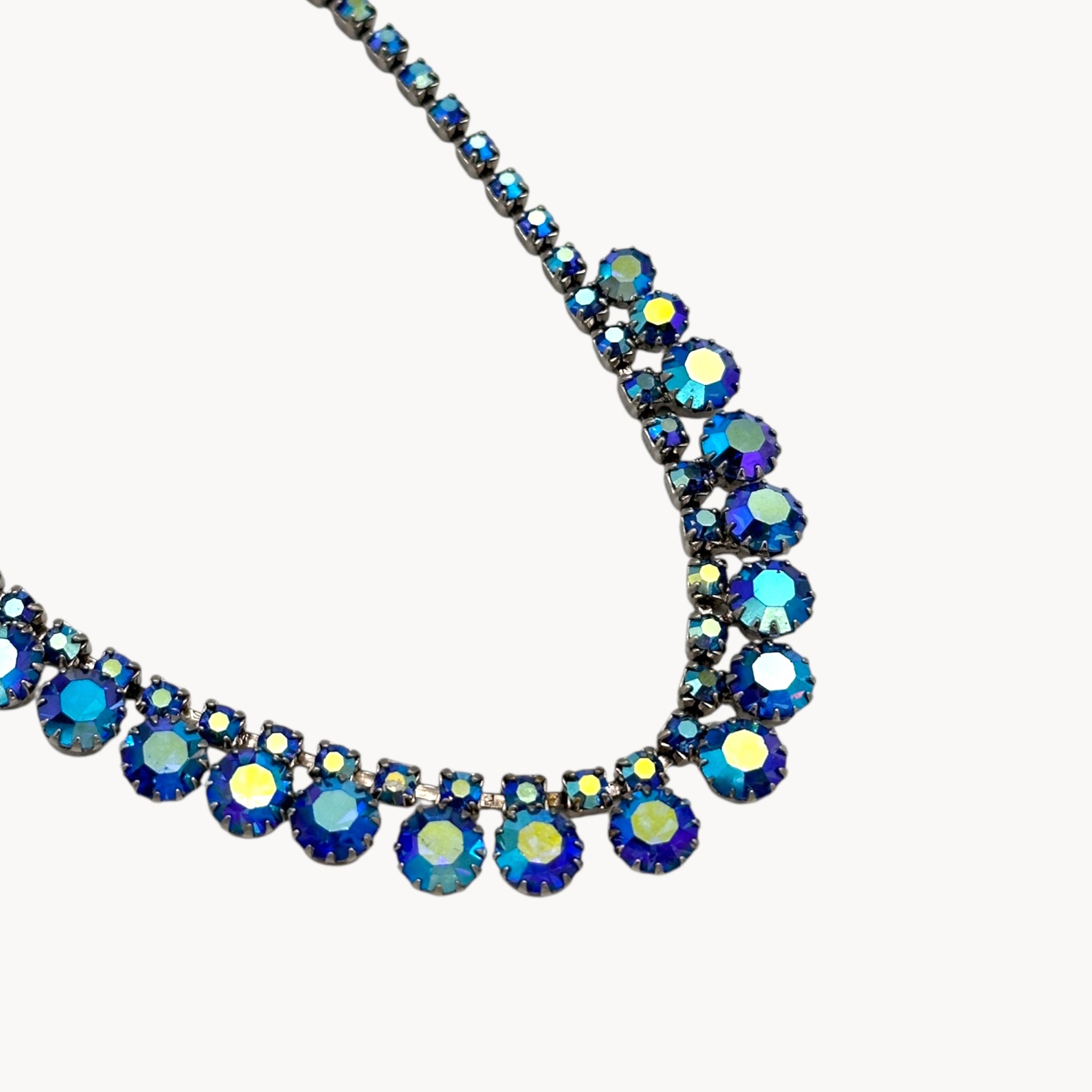 Close up Vintage unmarked blue aurora borealis rhinestone necklace, 1950s–1960s mid-century bridal jewelry.