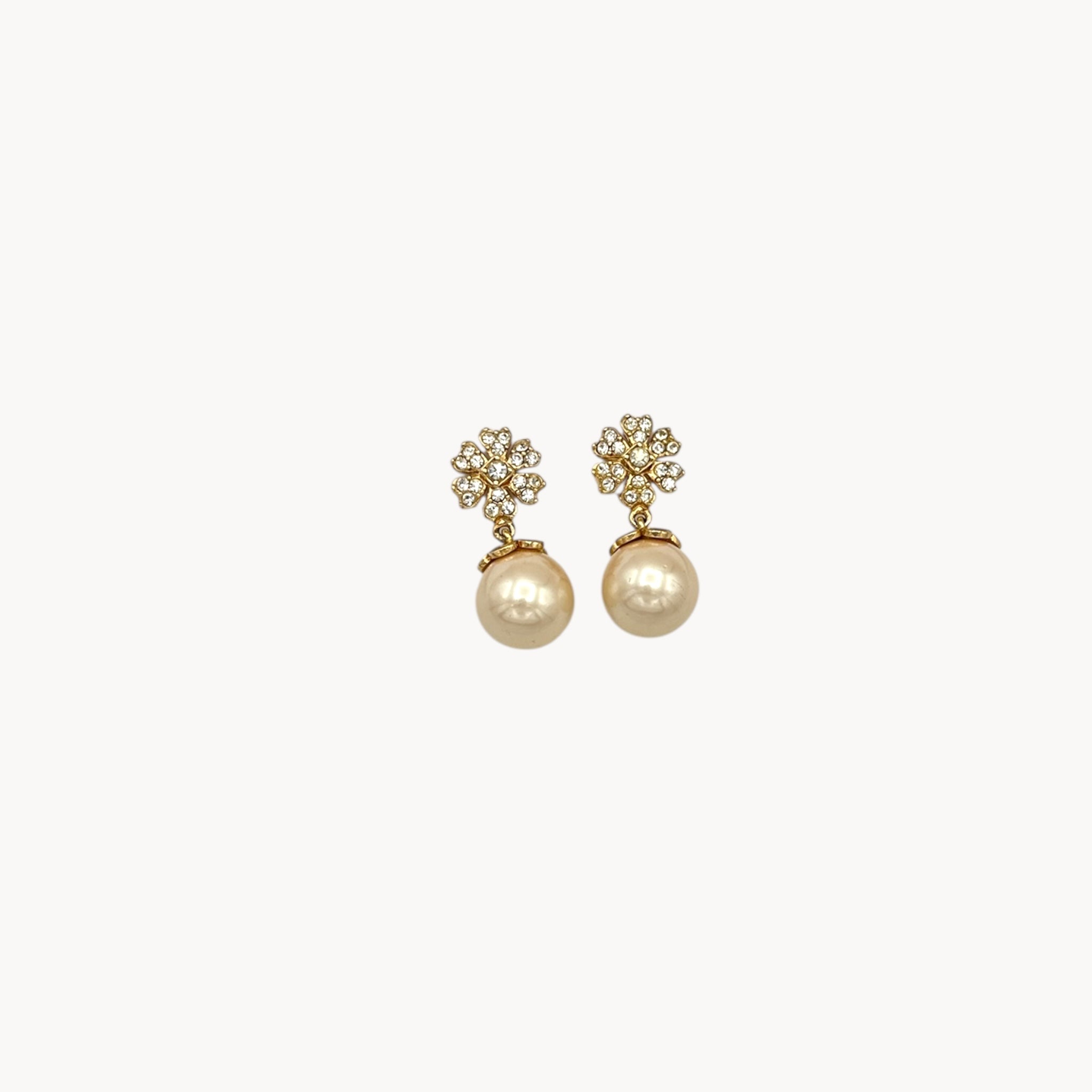 Vintage unmarked clip-on earrings with crystal floral tops and faux pearl drops, 1990s bridal jewelry.