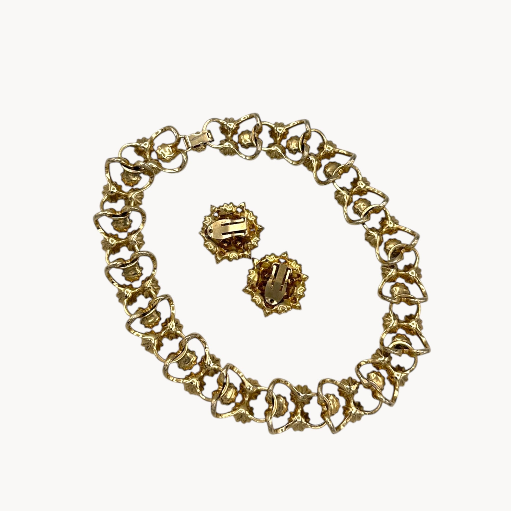 Back view of Vintage mid-century forget-me-not floral necklace and earring set with blue enamel flowers and rhinestones, 1950s bridal jewelry.