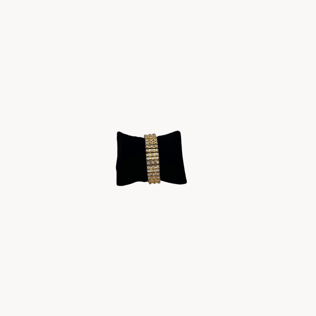 Front view of Vintage gold-tone expansion bracelet with three rows of rhinestones, mid-century design.