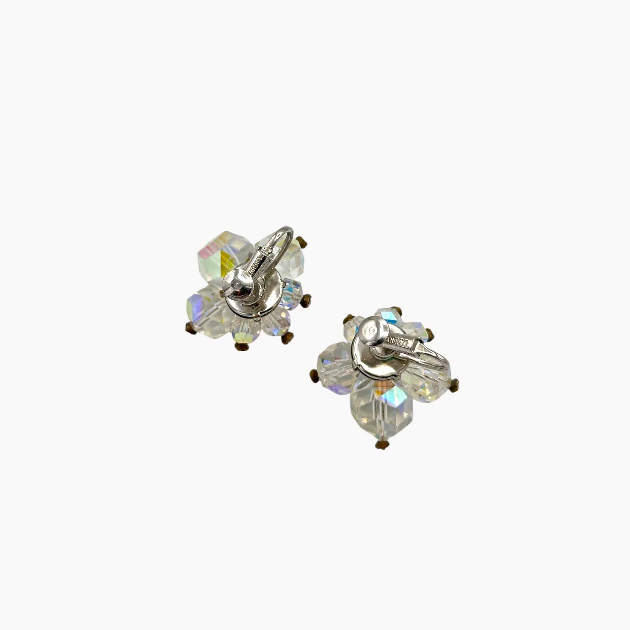 Back view of 1950s Laguna crystal cluster clip-on earrings with aurora borealis finish, vintage bridal jewelry