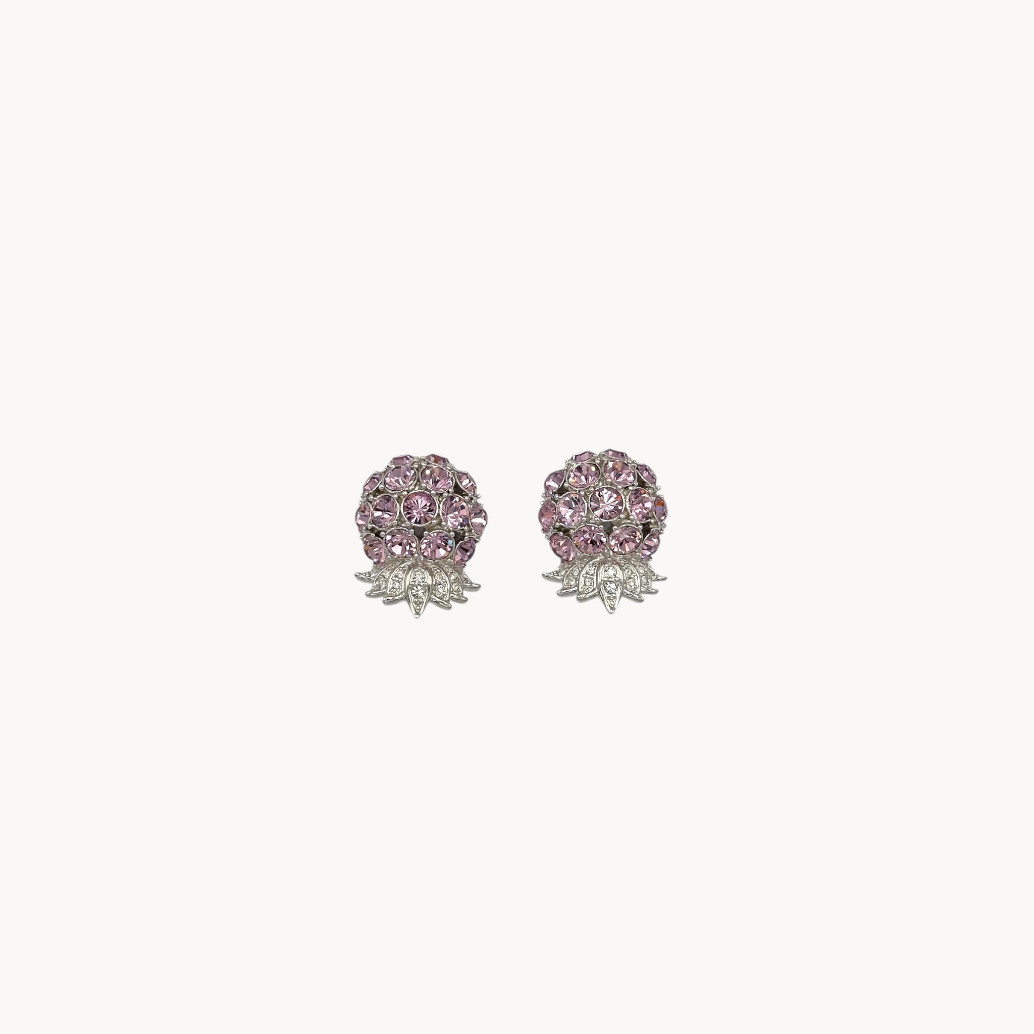 Vintage Nolan Miller rhinestone floral clip-on earrings with silver-tone leaves