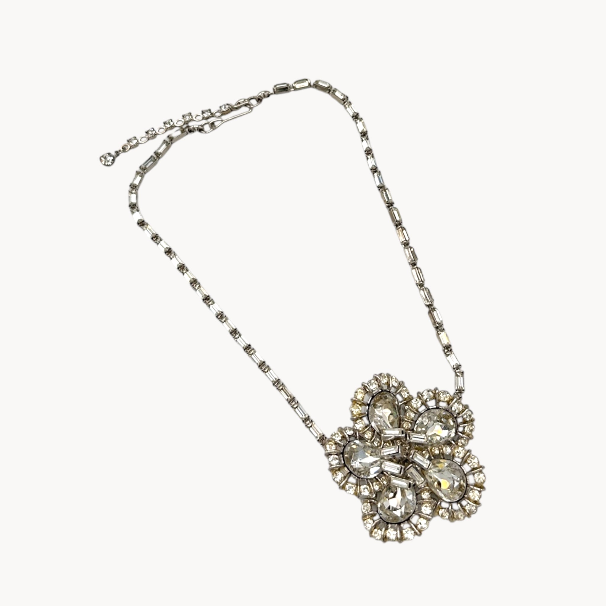 Large Trifari Rhinestone Floral Necklace on white background.