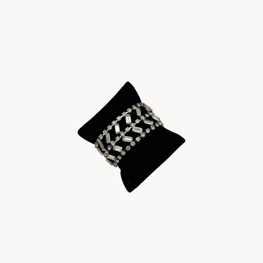 Side view of Vintage wide rhinestone bracelet with round and baguette-cut stones