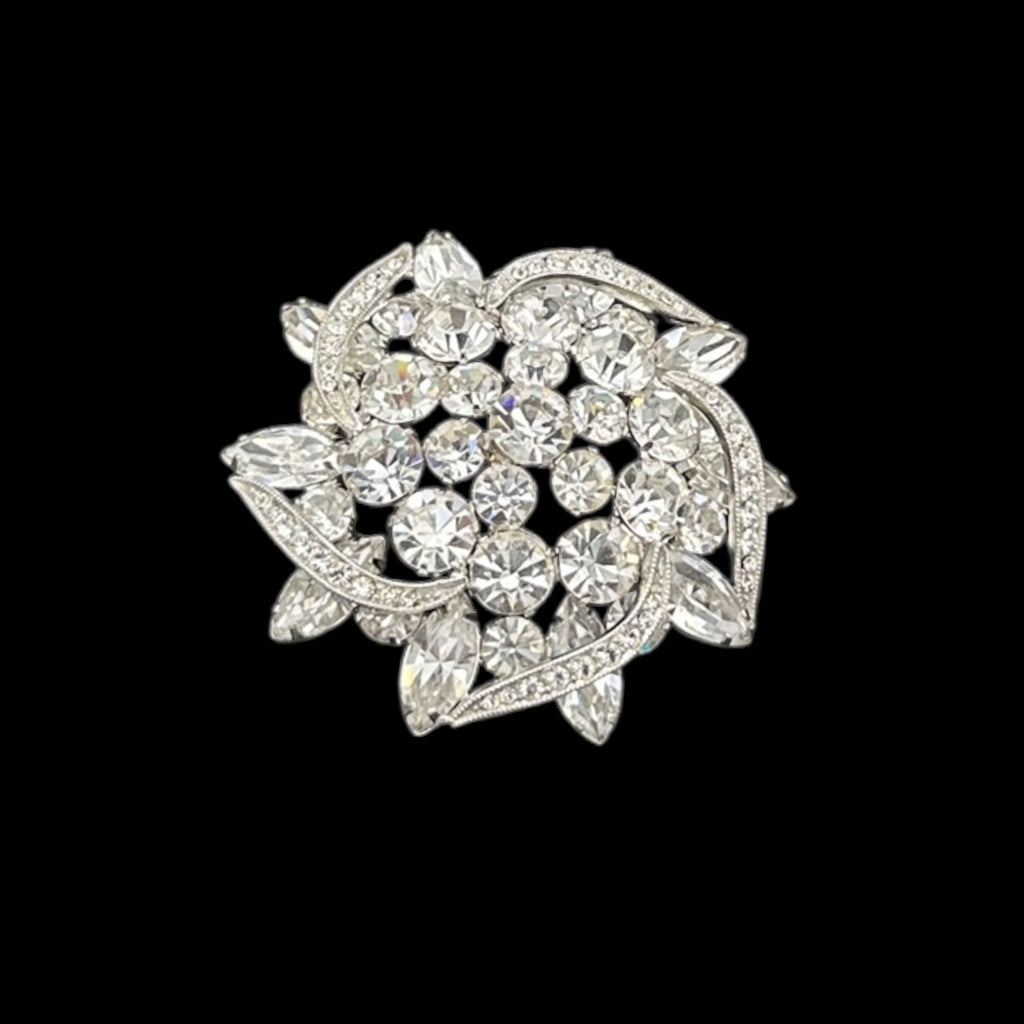 Rhinestone brooch with crystal stones on a black background