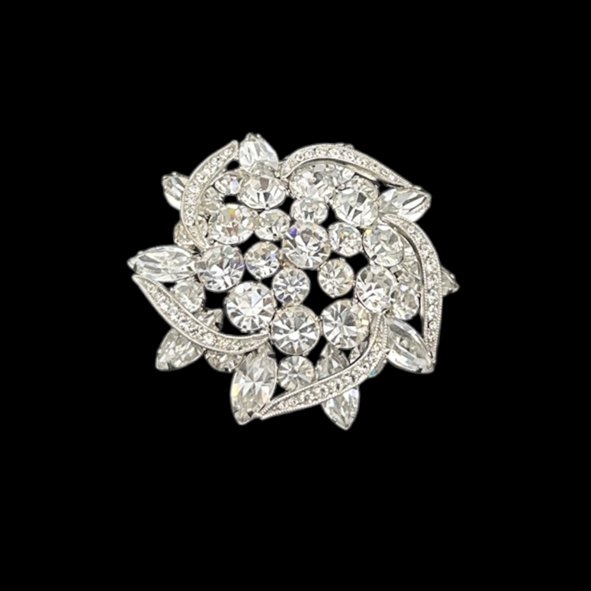 Rhinestone brooch with crystal stones on a black background