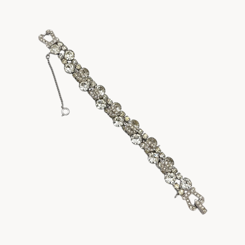 Flat lay of Vintage Weiss rhinestone statement bracelet with large prong-set stones.