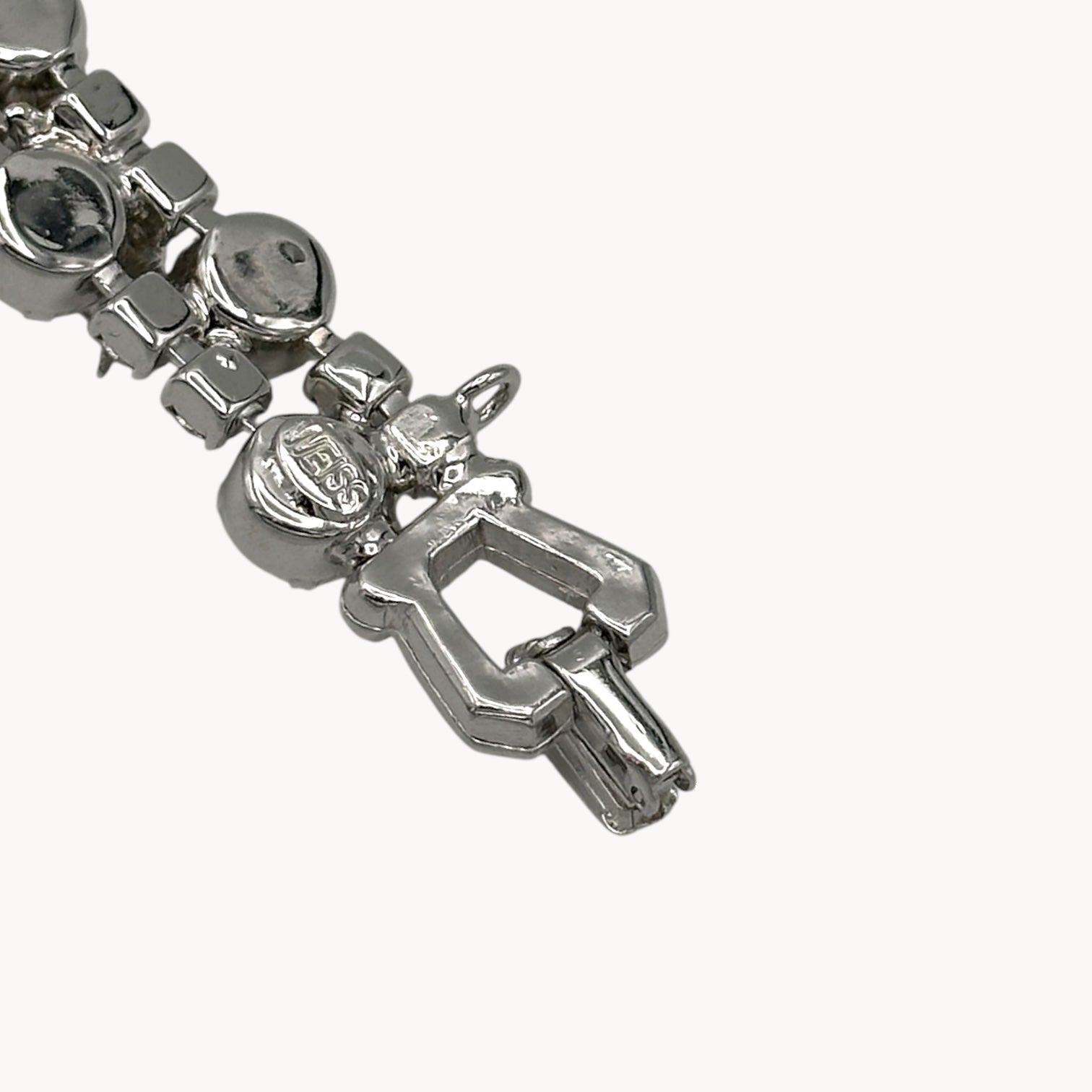 Back view of the clasp of Vintage Weiss rhinestone statement bracelet with large prong-set stones.