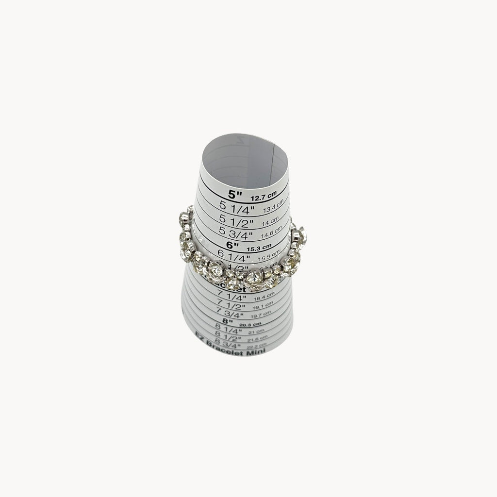 On sizer view of Vintage Weiss rhinestone statement bracelet with large prong-set stones.