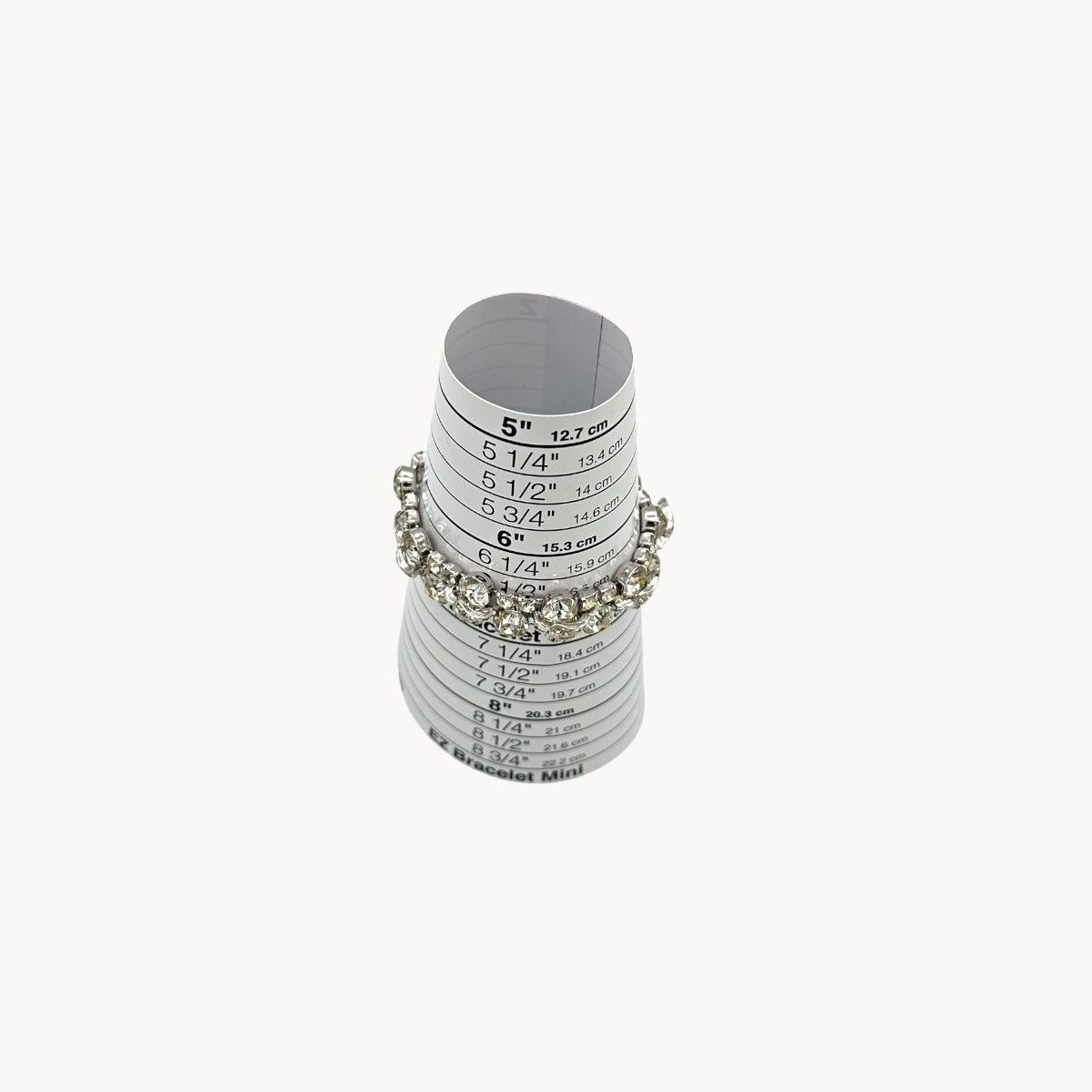 On sizer view of Vintage Weiss rhinestone statement bracelet with large prong-set stones.