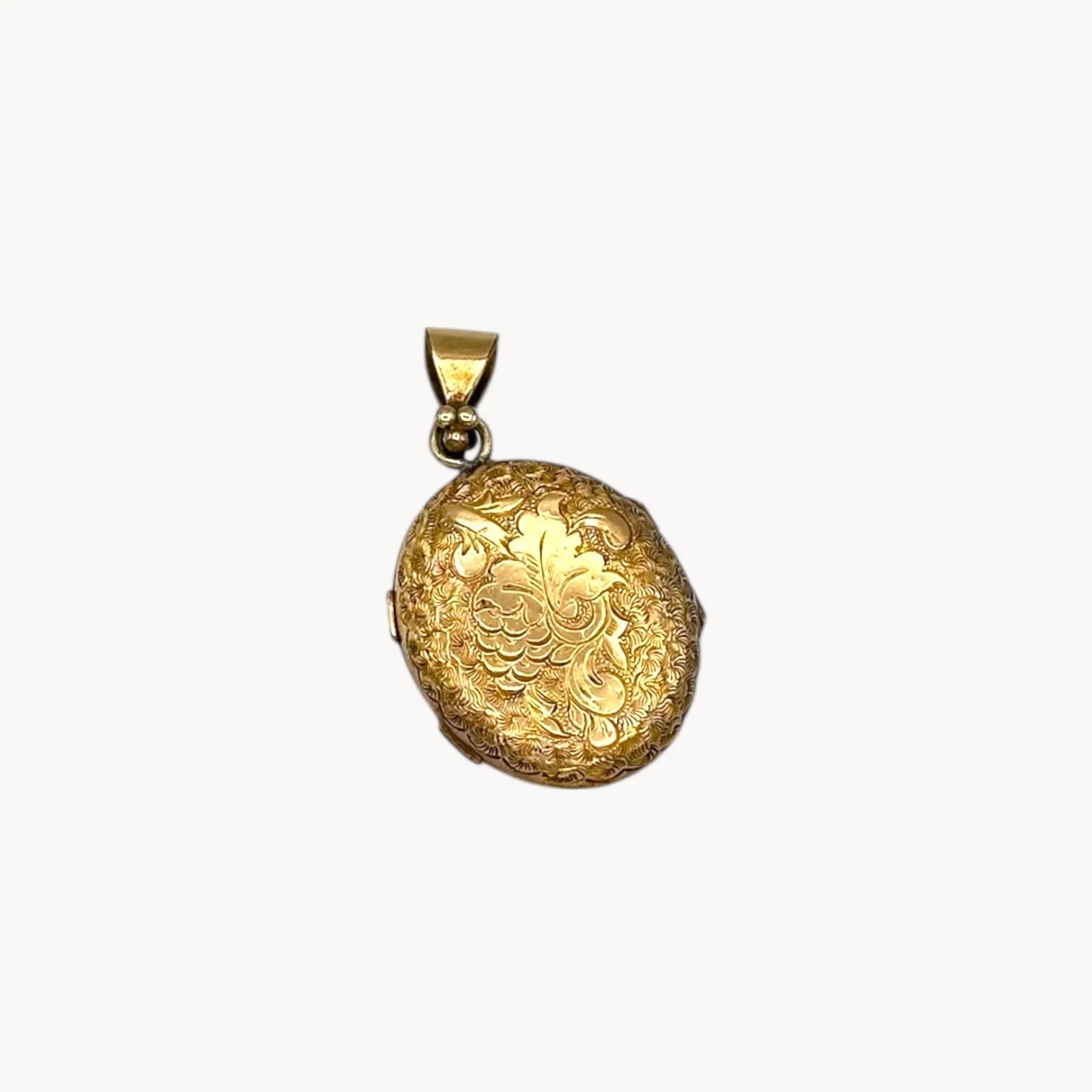 Back view Antique gold-filled etched floral locket with ornate border, Victorian keepsake pendant.