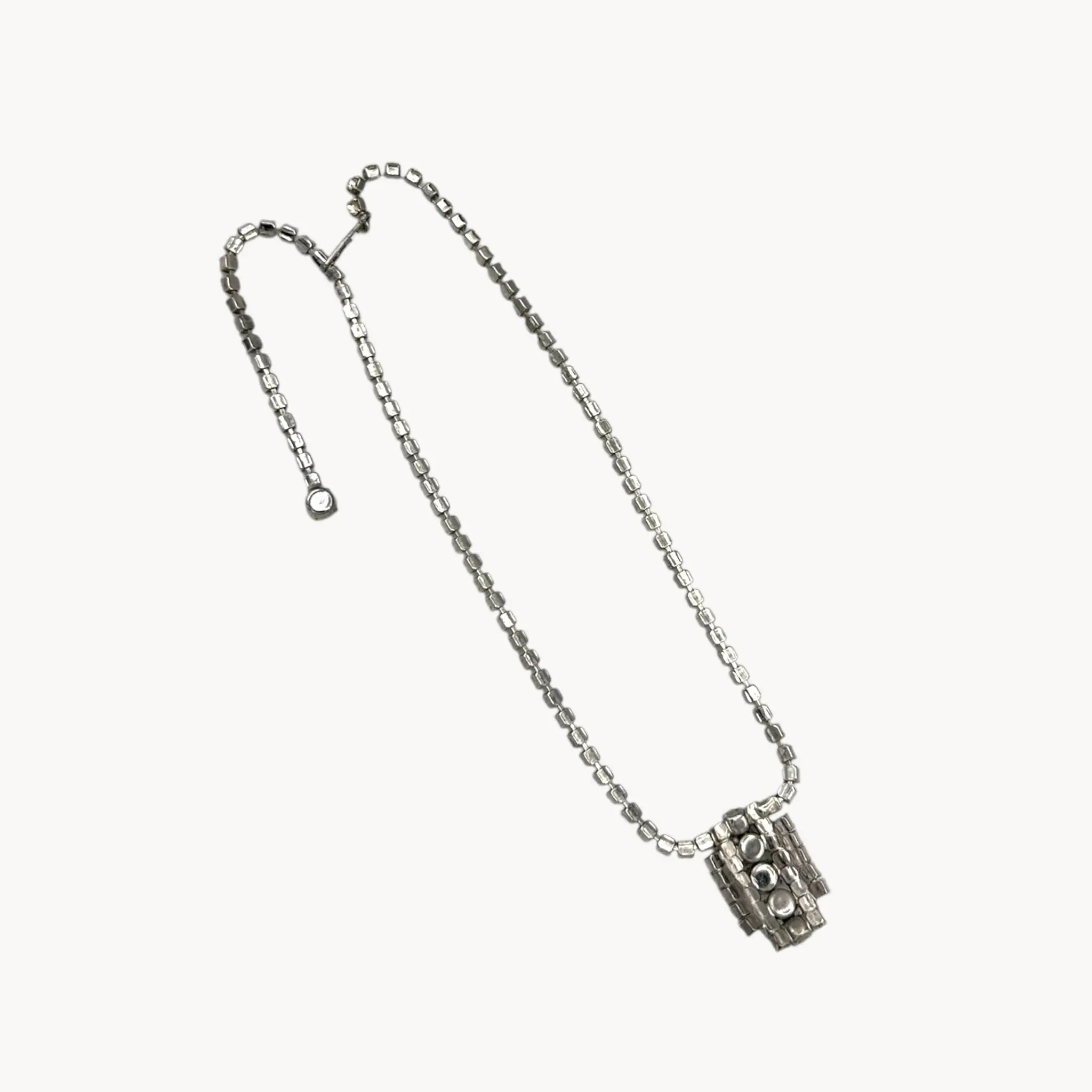 Back view of 1950s Art Deco style rhinestone necklace with geometric pendant drop, vintage mid-century bridal jewelry
