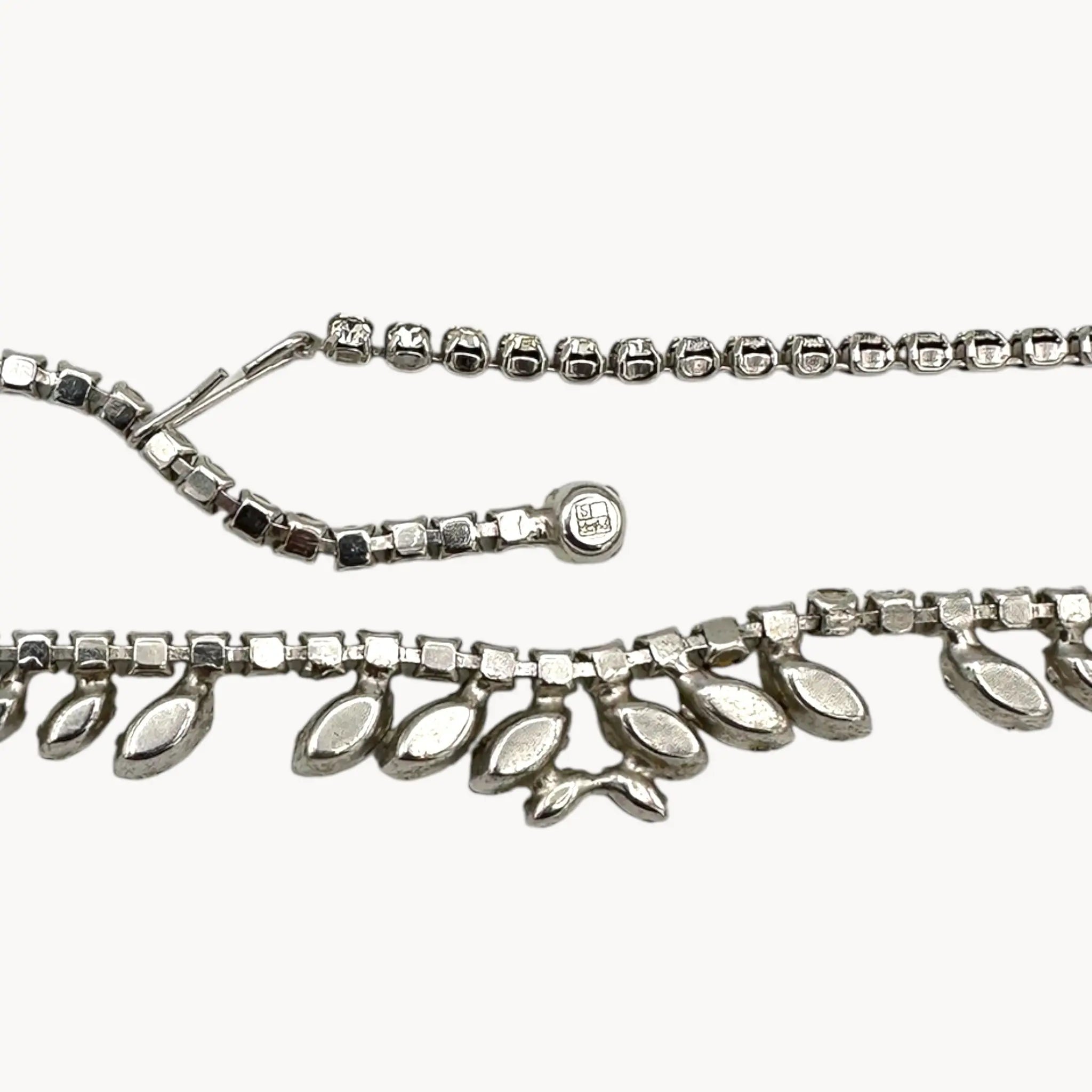 Back view of 1950s B. David rhinestone necklace with round and marquise stones in garland design, vintage bridal jewelry.