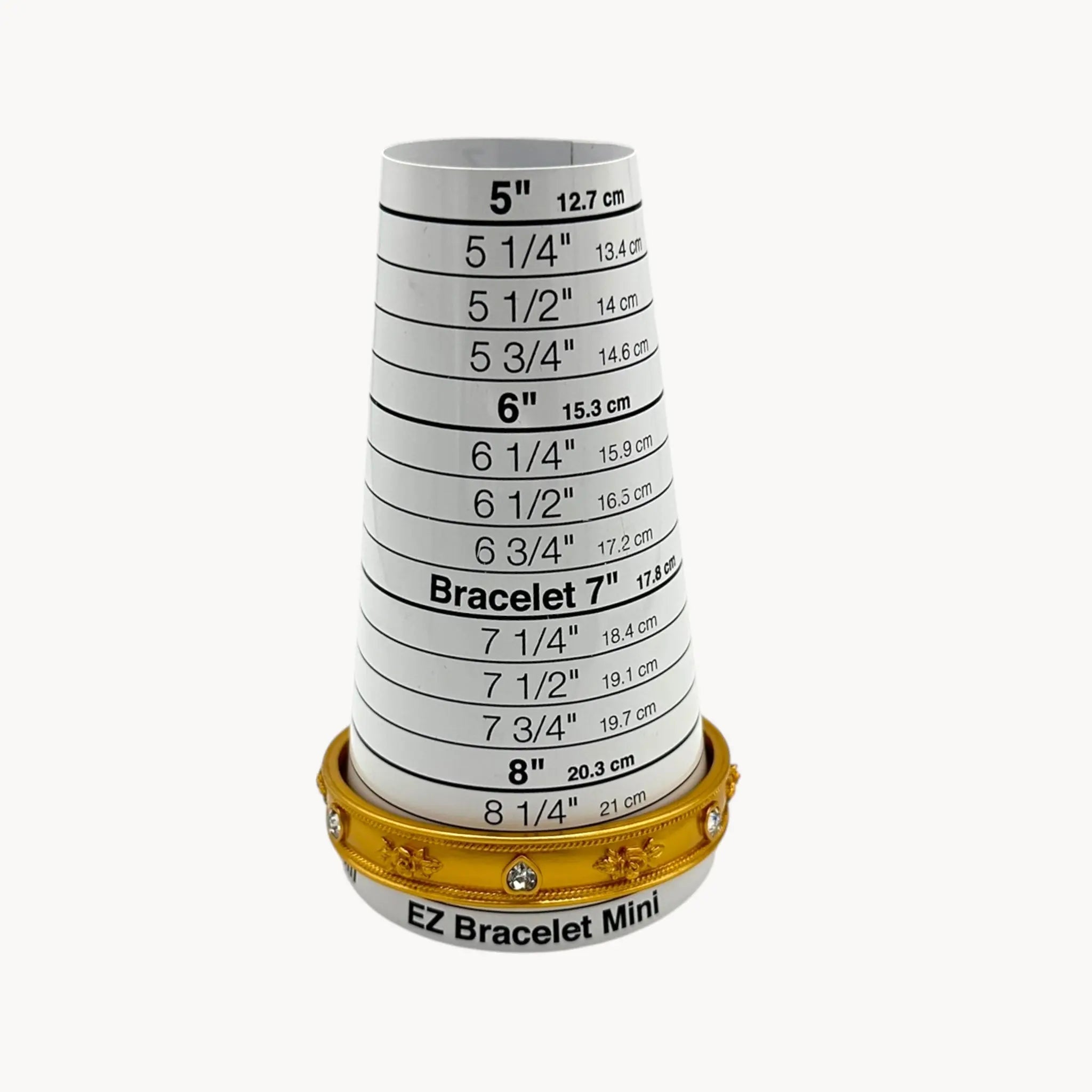 Size view of Elizabeth Taylor Love Blooms gold bangle bracelet with crystal heart and floral accents.