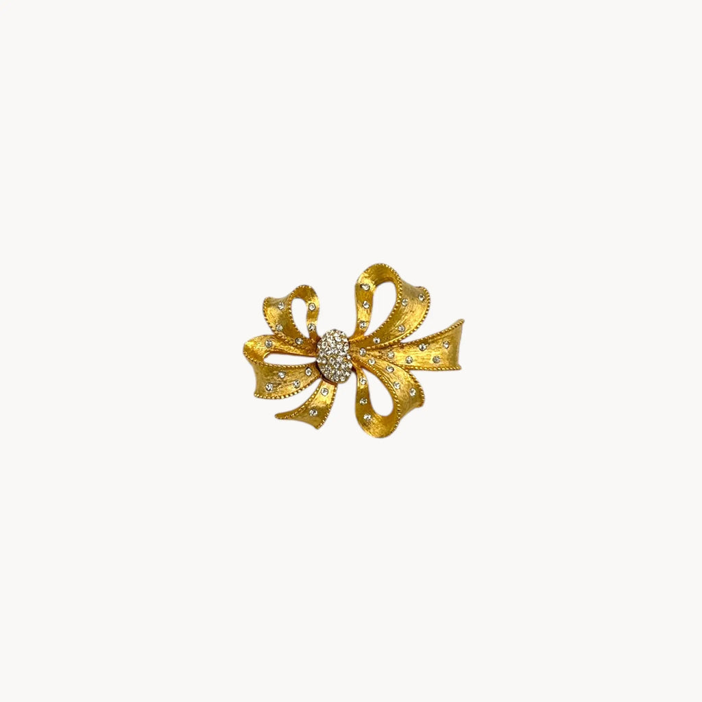 Vintage gold rhinestone bow brooch with ribbon design