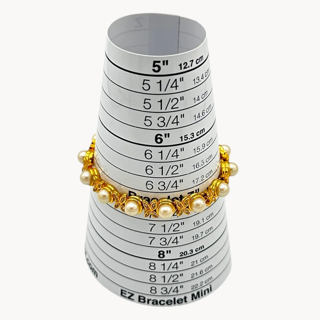 Size view of Joan Rivers gold bracelet with pearls and rhinestones.