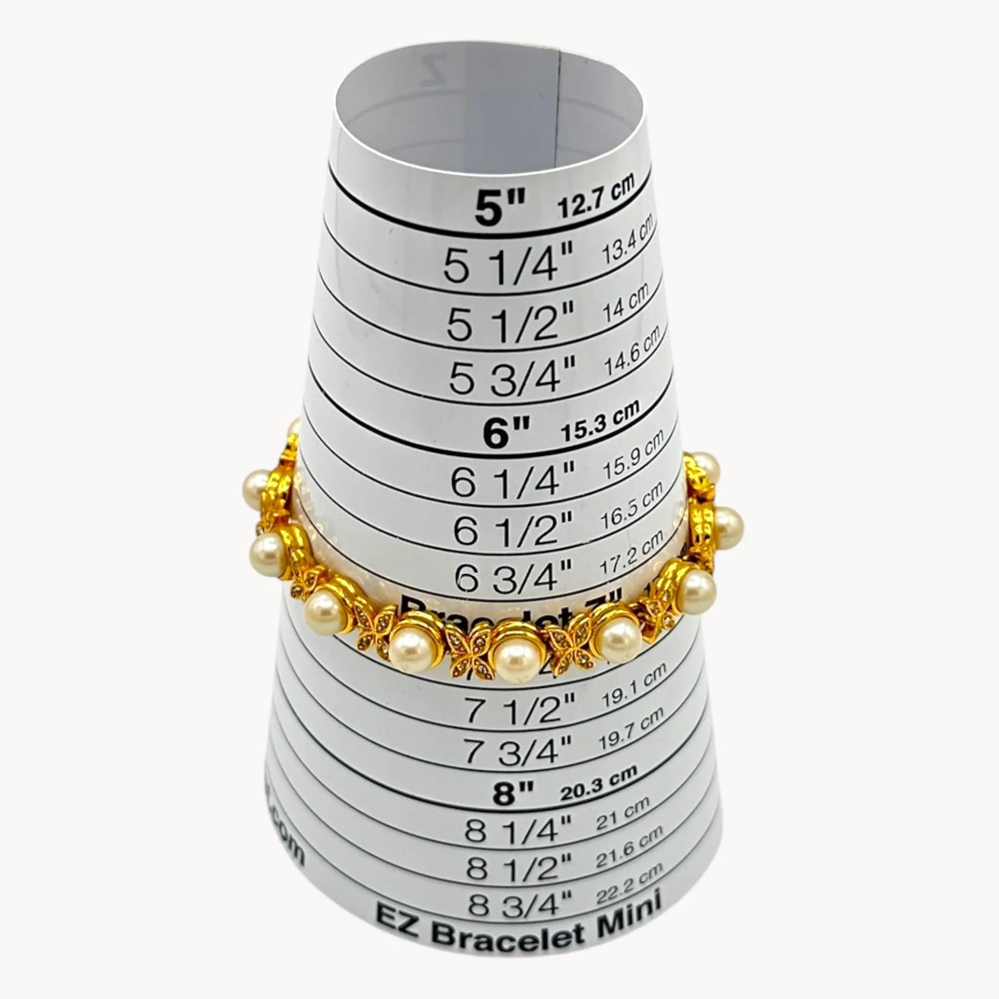 Size view of Joan Rivers gold bracelet with pearls and rhinestones.