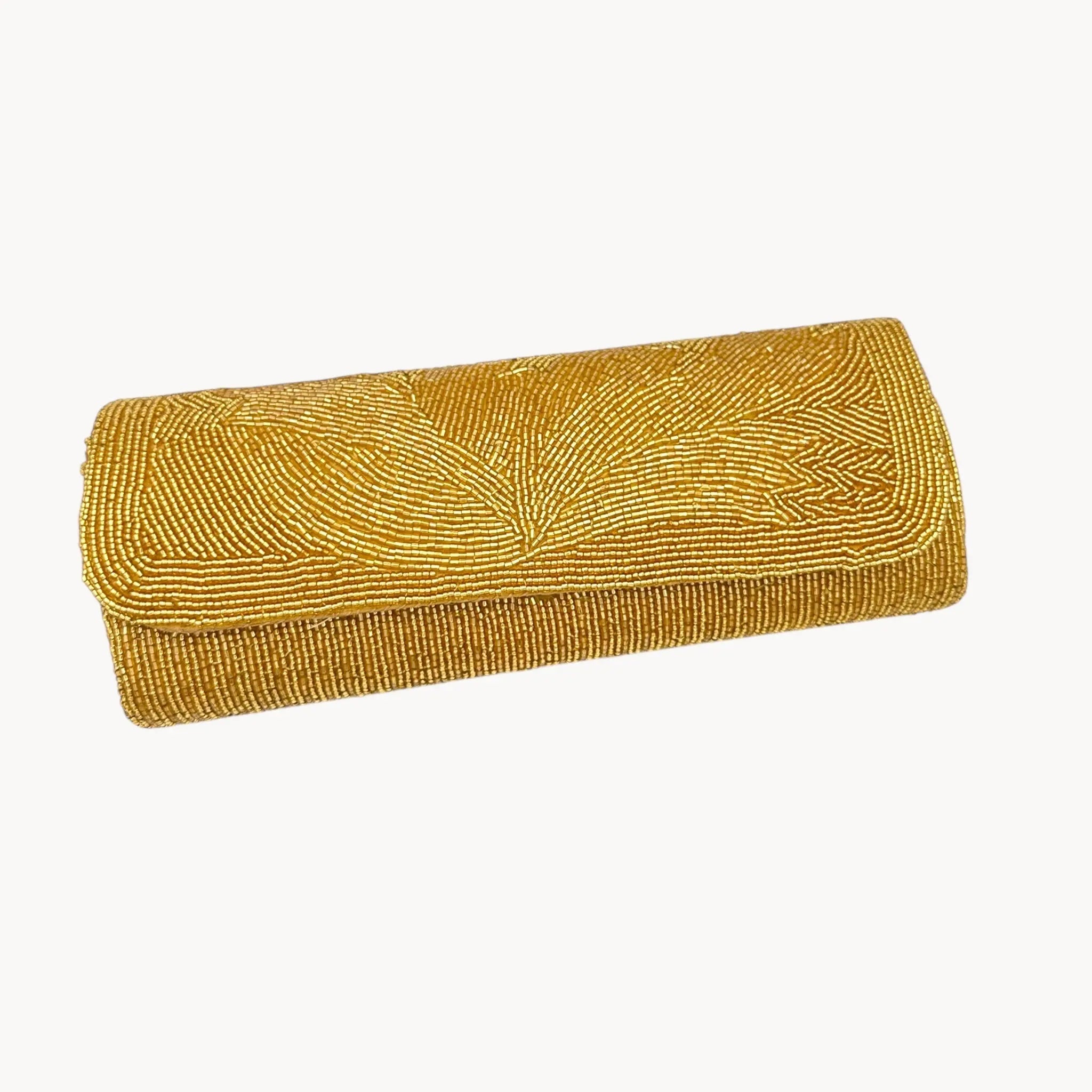 La Regale vintage gold beaded clutch crossbody handbag, evening bag shown as a clutch on white background.