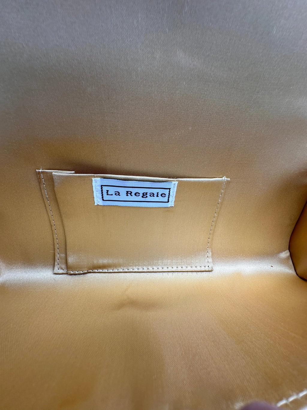 Inside view of La Regale vintage gold beaded clutch crossbody handbag, evening bag.