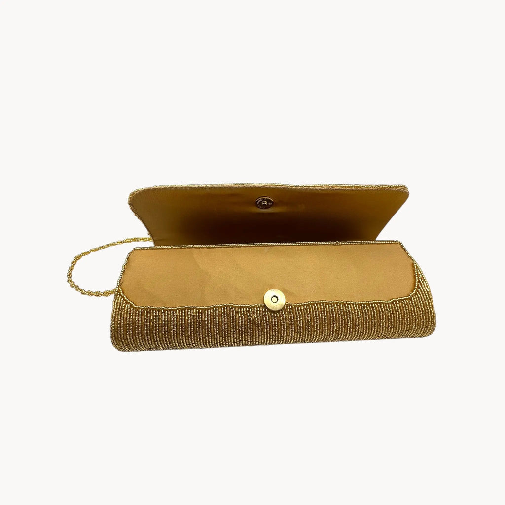 Clasp view of La Regale vintage gold beaded clutch crossbody handbag, evening bag on white background.