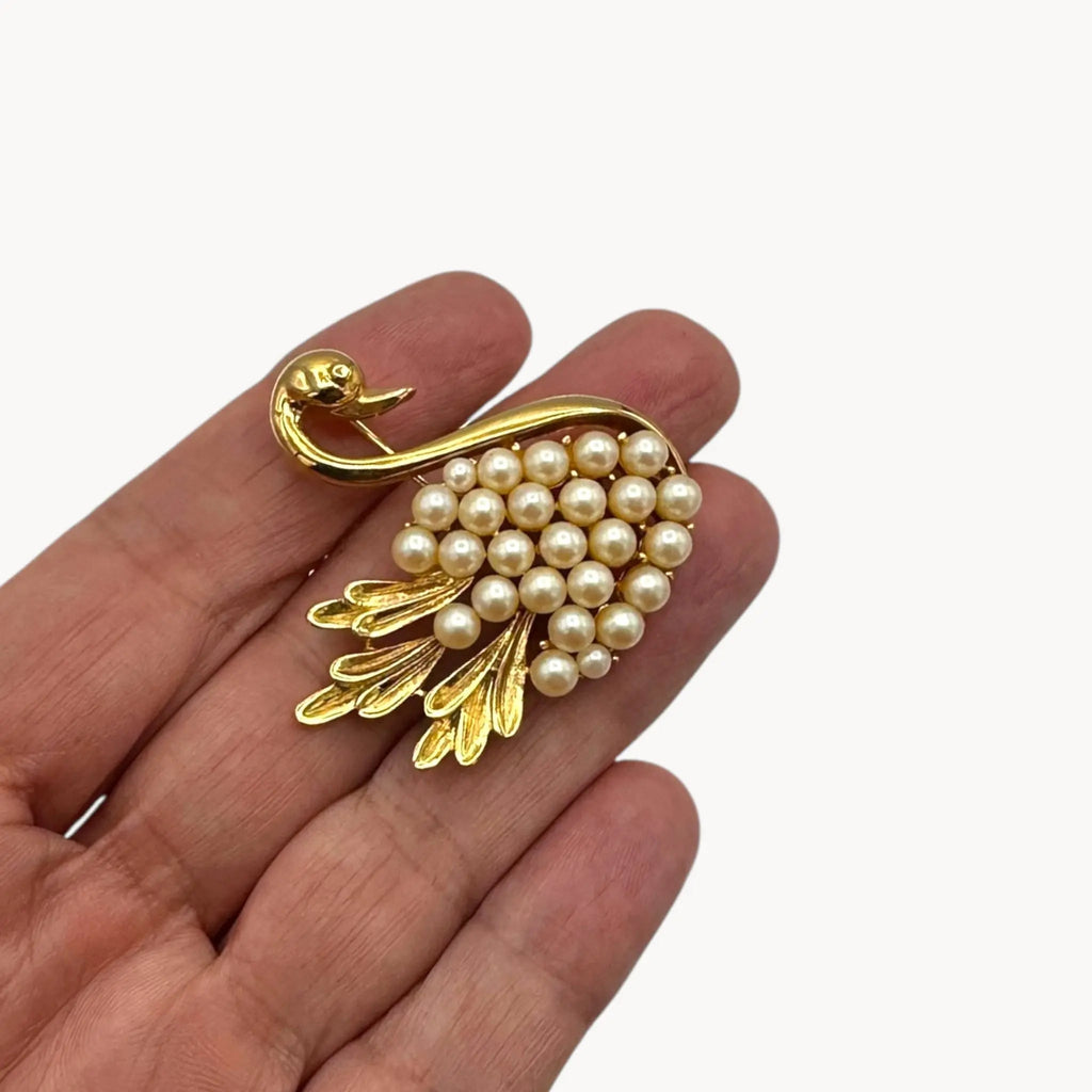 Size view of Midcentury gold swan brooch with faux pearls