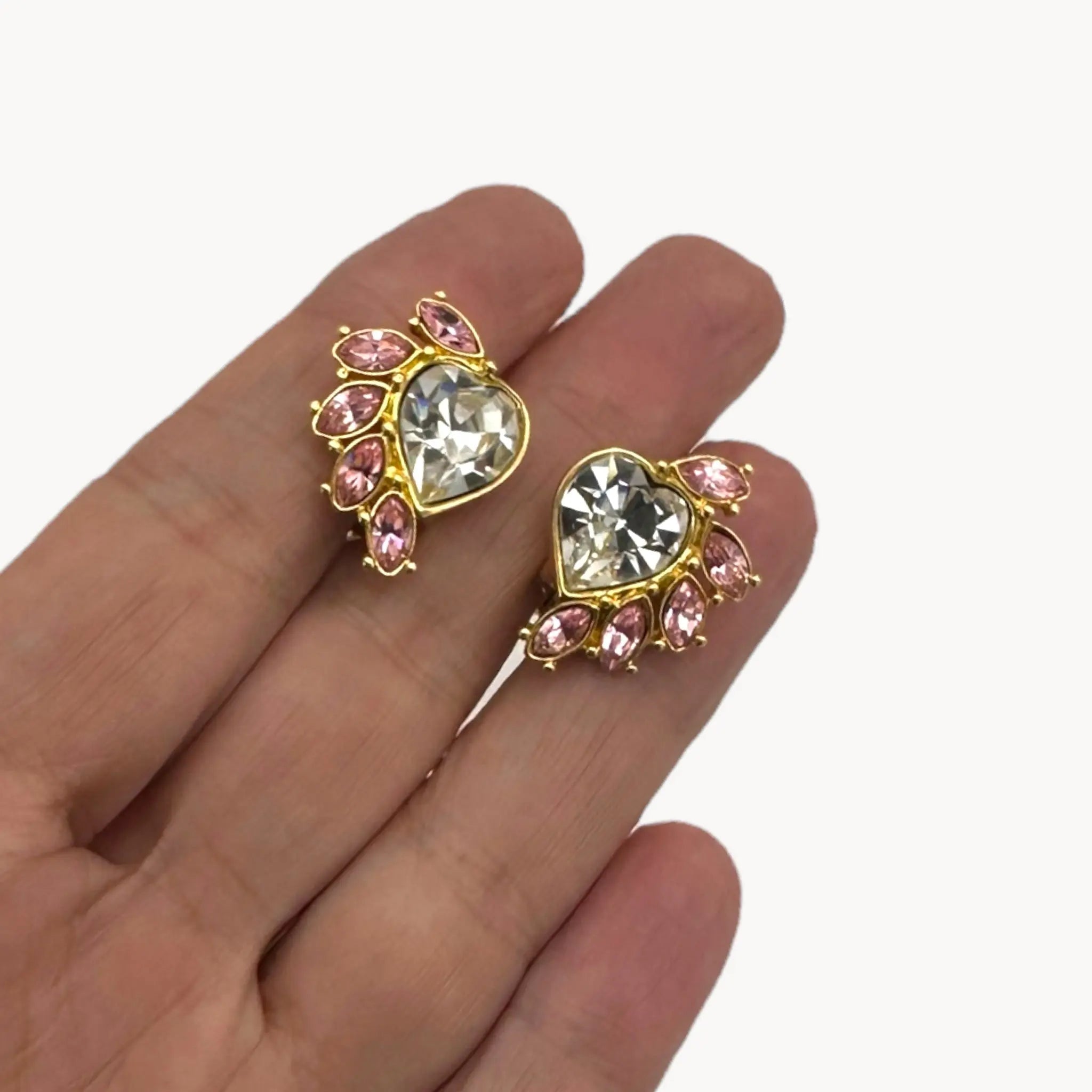 Size view of earrings of Vintage Monet gold necklace and clip-on earring set with clear heart and pink rhinestones.