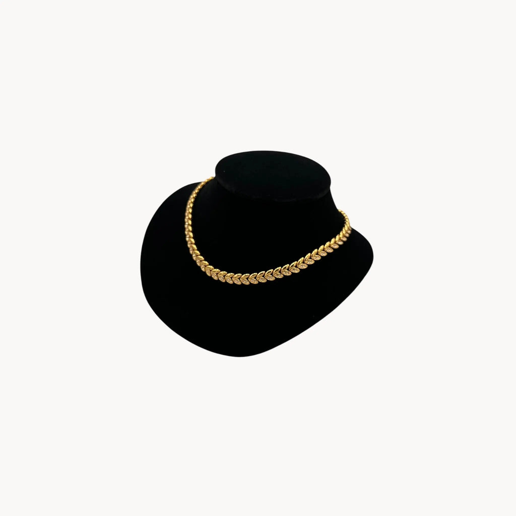 Side view of Avon vintage gold link rhinestone necklace, classic 1980s–1990s bridal and evening jewelry.