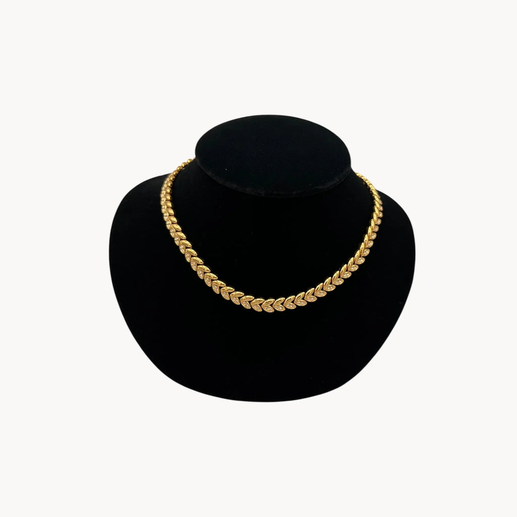 Close up view of Avon vintage gold link rhinestone necklace, classic 1980s–1990s bridal and evening jewelry.