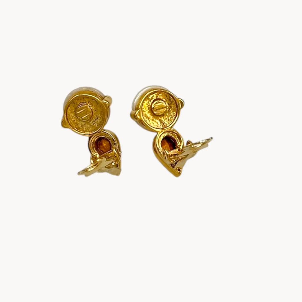 Back view with clip open Nina Ricci vintage faux pearl and crystal teardrop clip-on earrings, 1980s bridal jewelry.