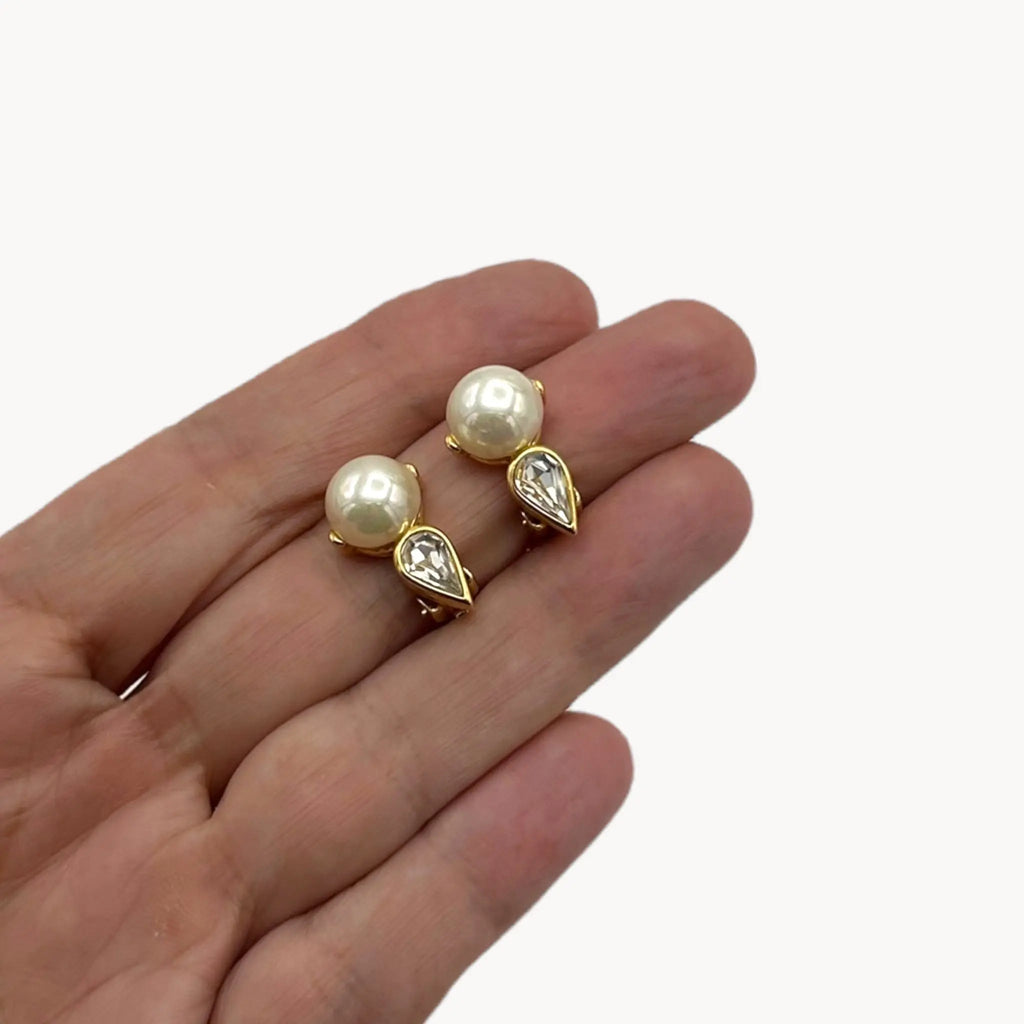 Scale size view Nina Ricci vintage faux pearl and crystal teardrop clip-on earrings, 1980s bridal jewelry.