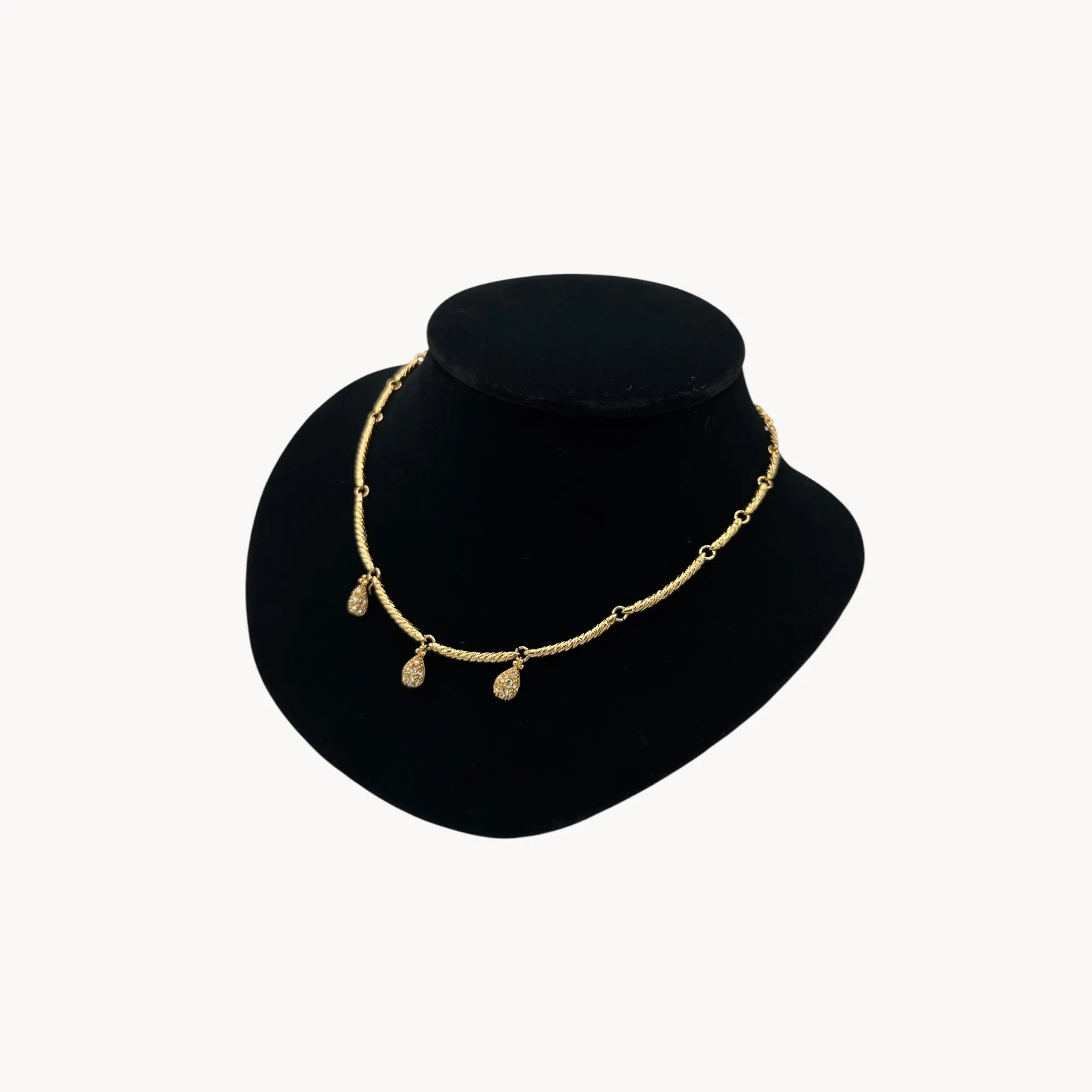 Side view Nolan Miller gold adjustable necklace with removable rhinestone teardrop dangles, vintage bridal jewelry.