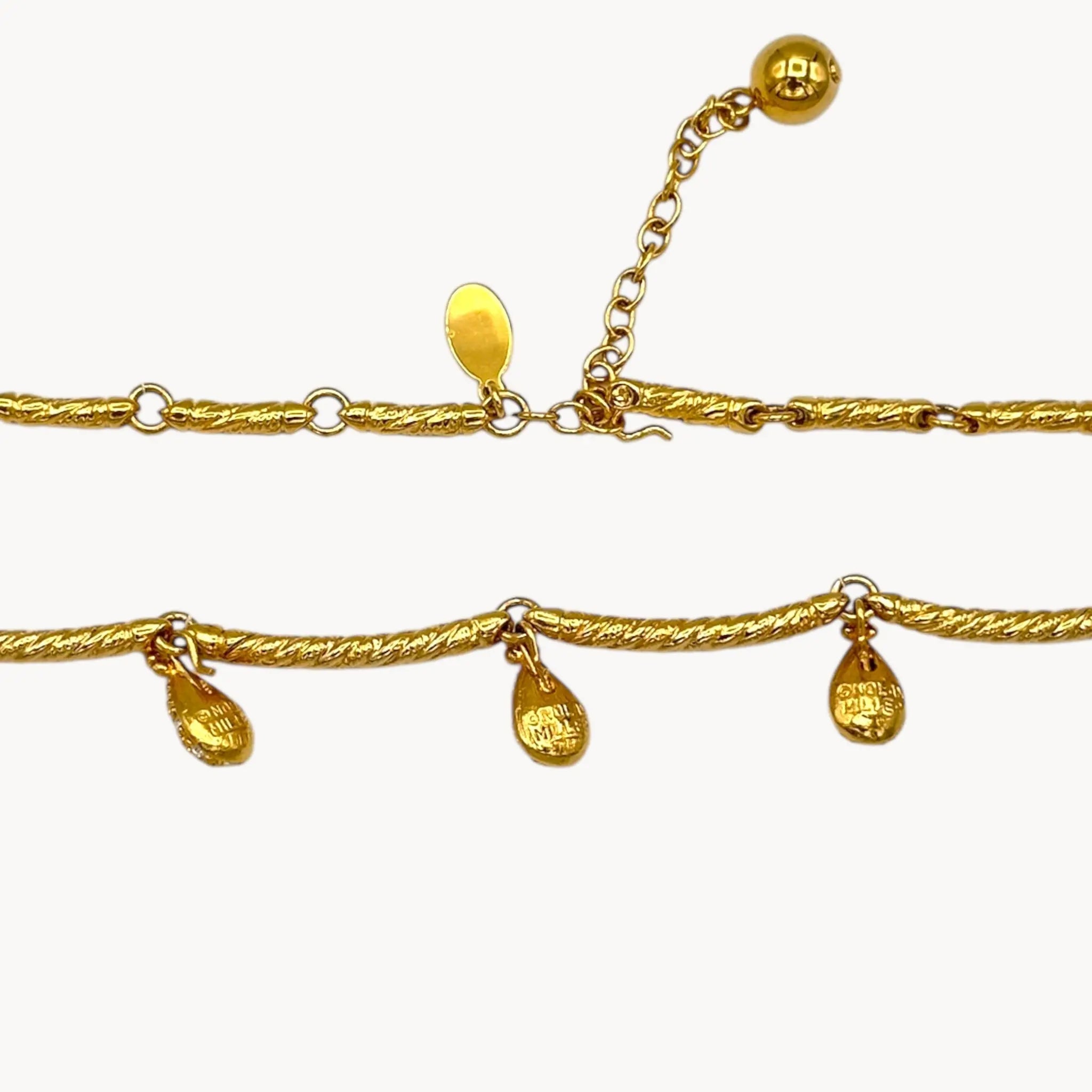 Back view of Nolan Miller gold adjustable necklace with removable rhinestone teardrop dangles, vintage bridal jewelry.