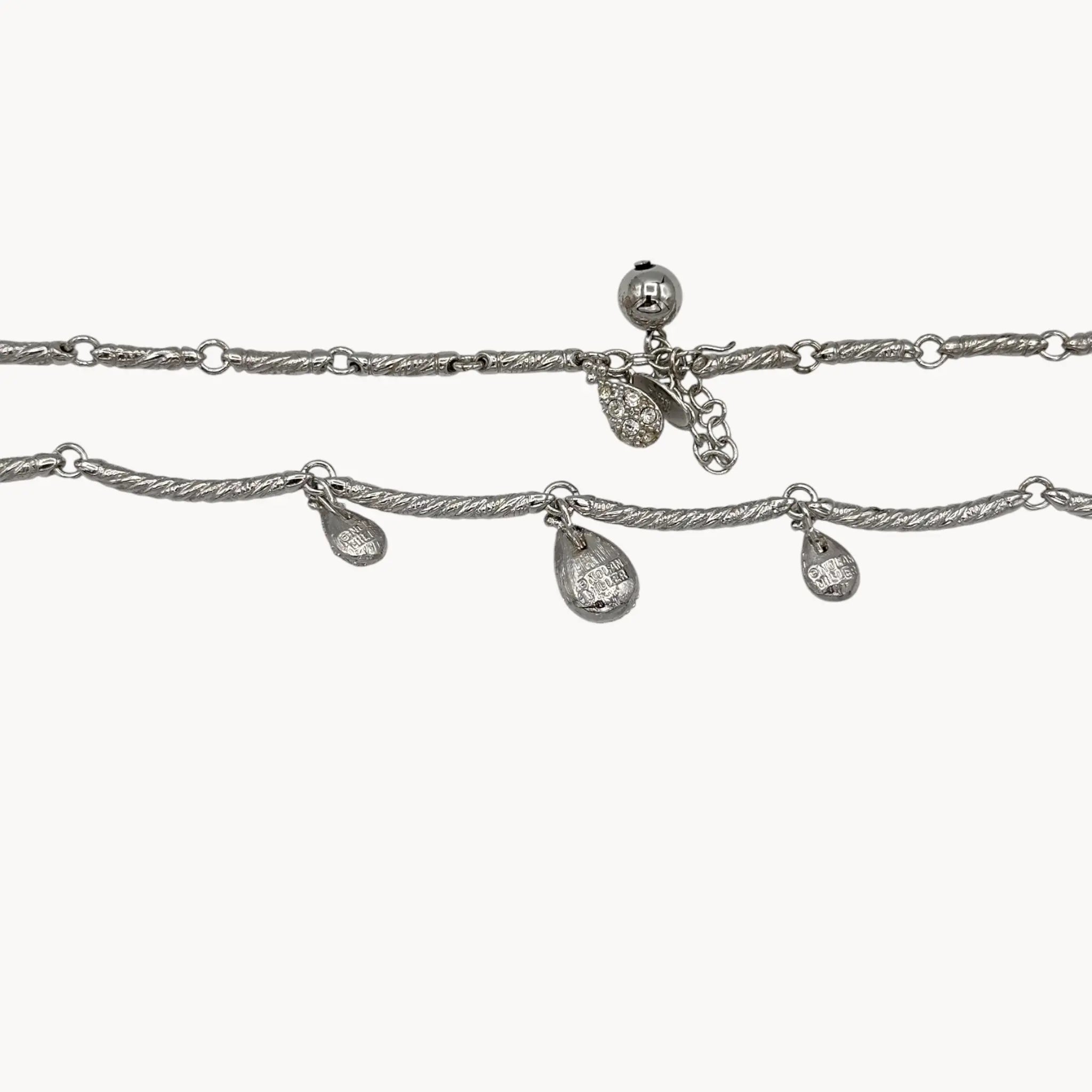 Back view of Nolan Miller silver adjustable necklace with removable rhinestone teardrop dangles, vintage bridal jewelry.