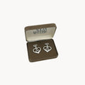 Vintage Nolan Miller rhinestone heart dangle pierced earrings with double open-heart design in orginal box.